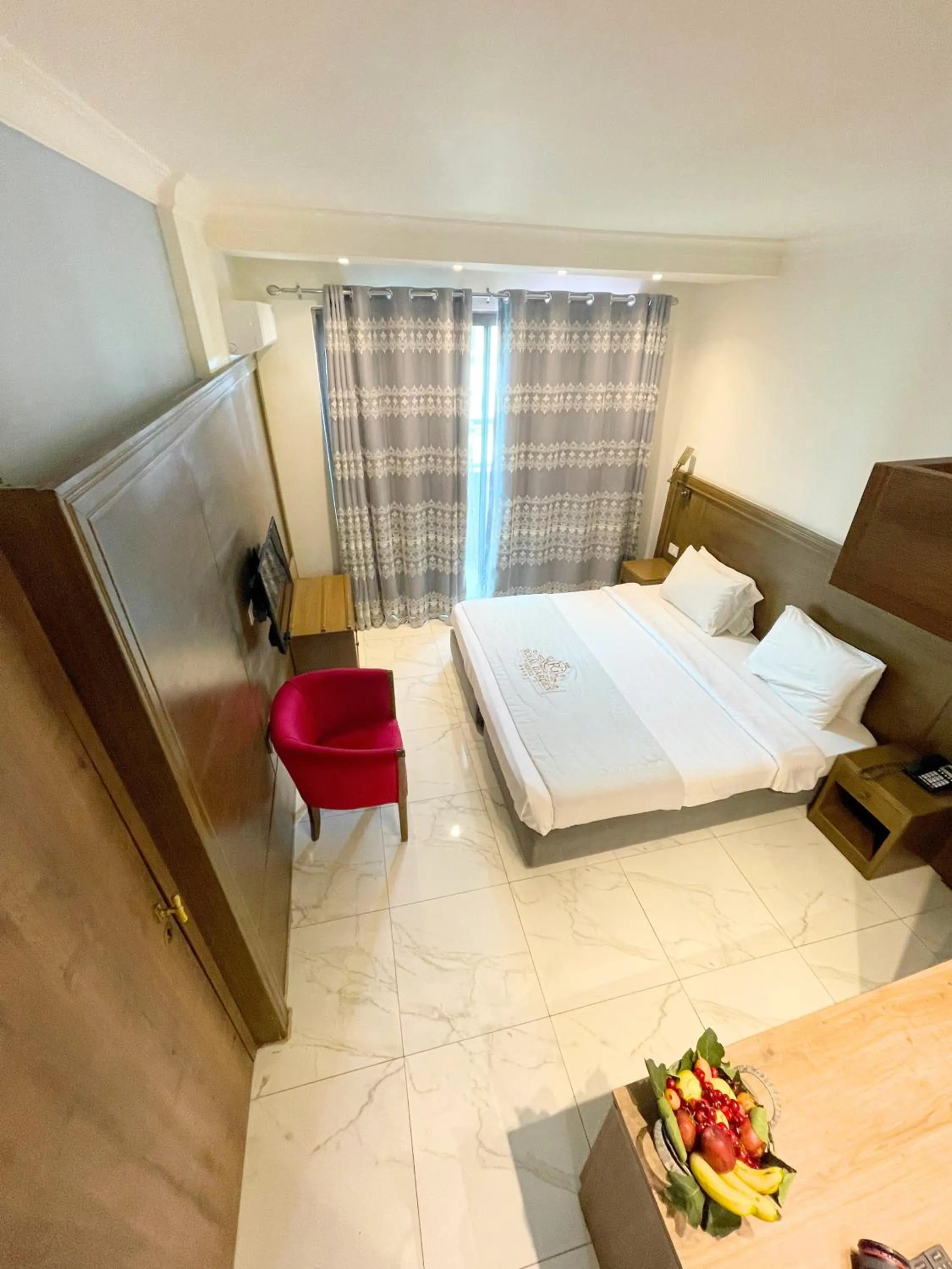 Bed in Royal Garden Hotel