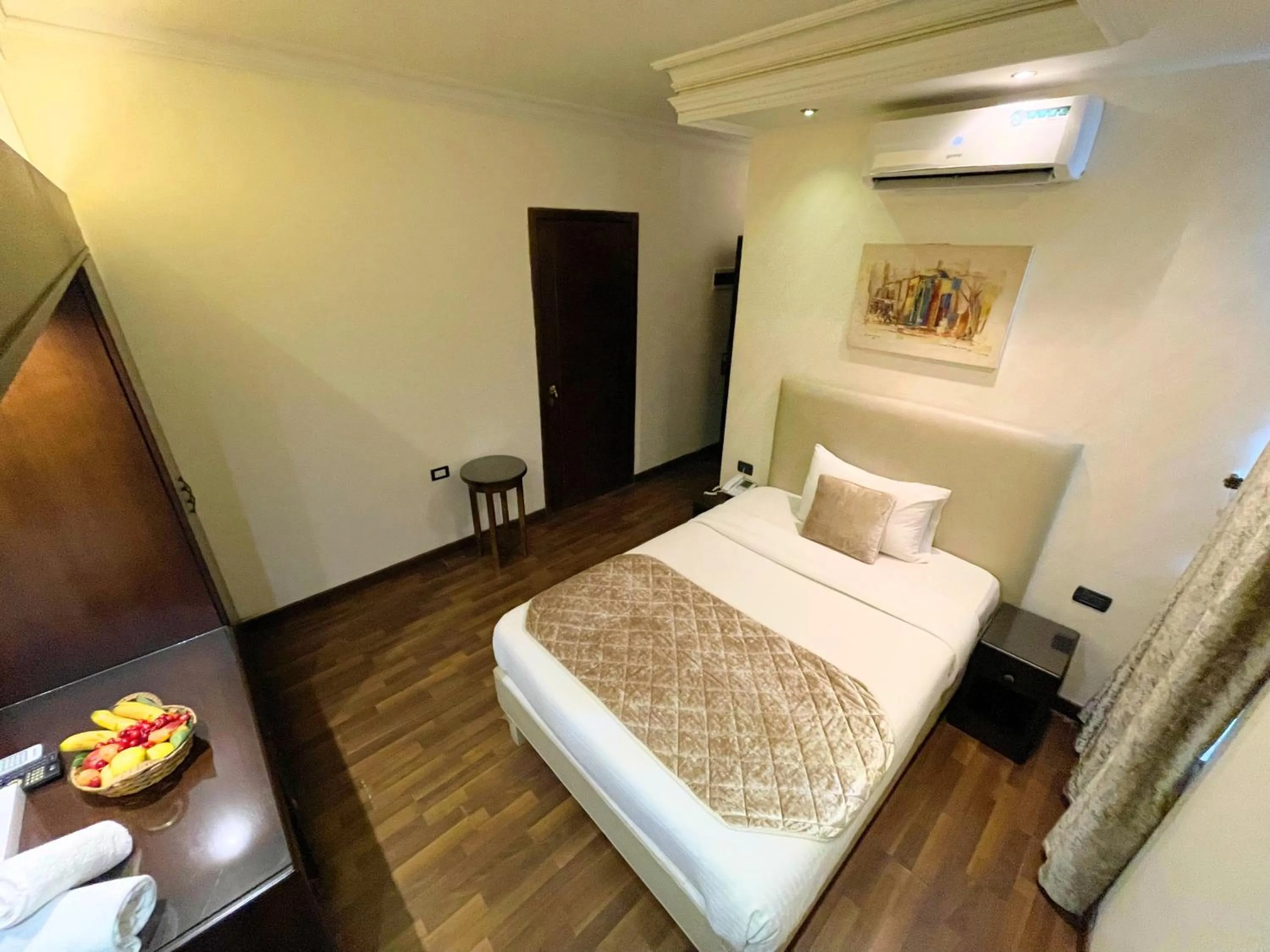 Bed in Royal Garden Hotel