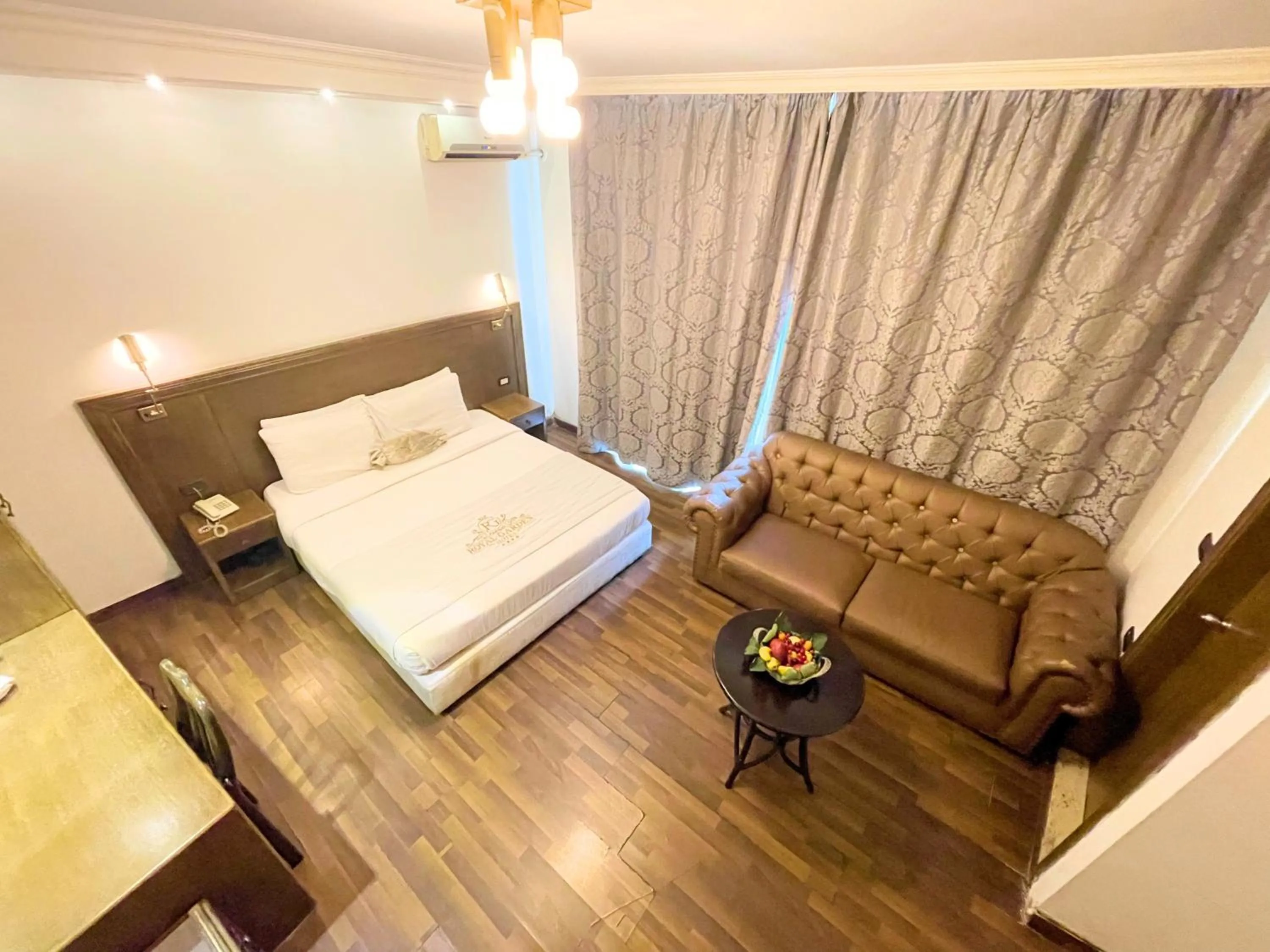 Bed in Royal Garden Hotel