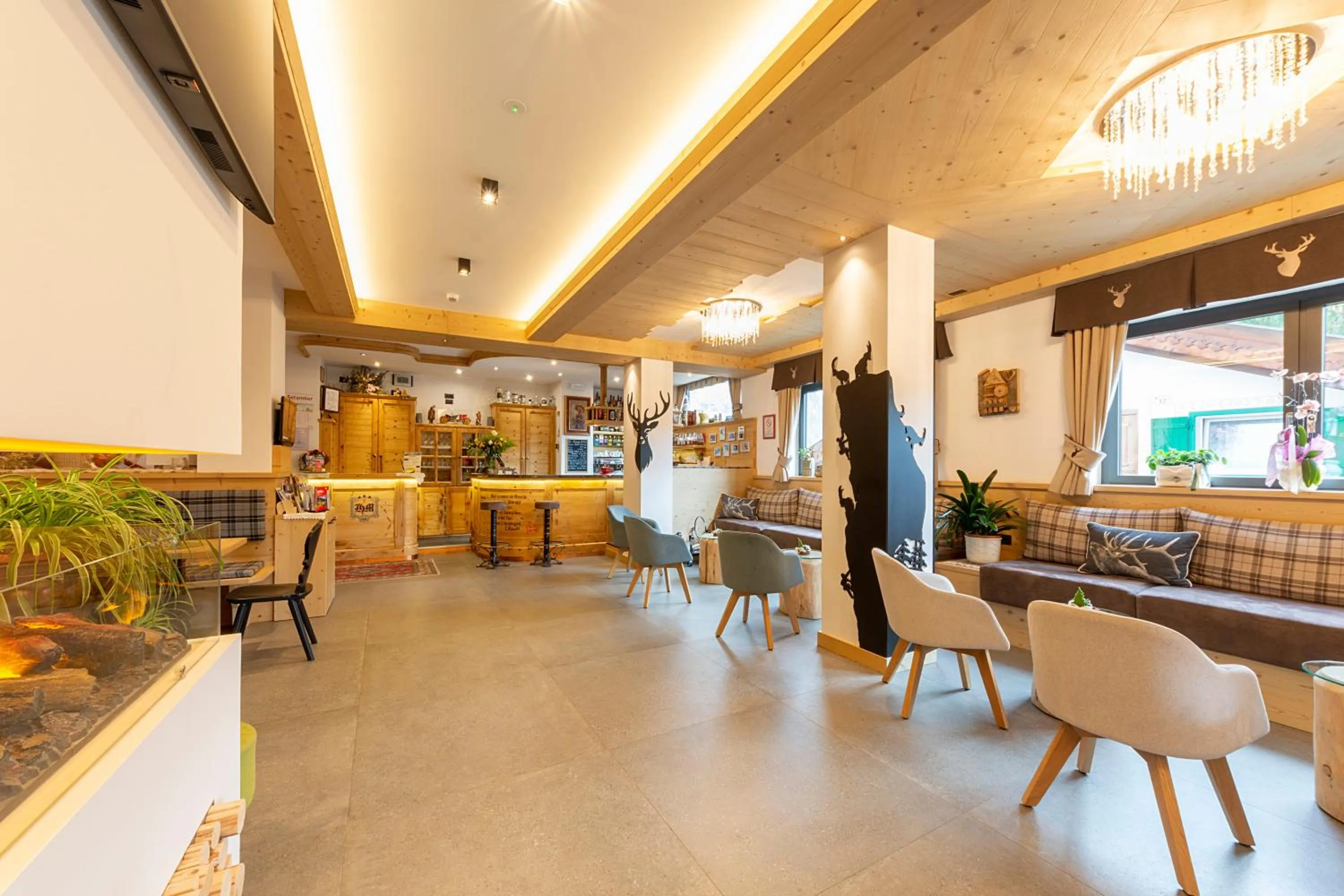 Lobby or reception in Monza Dolomites Hotel