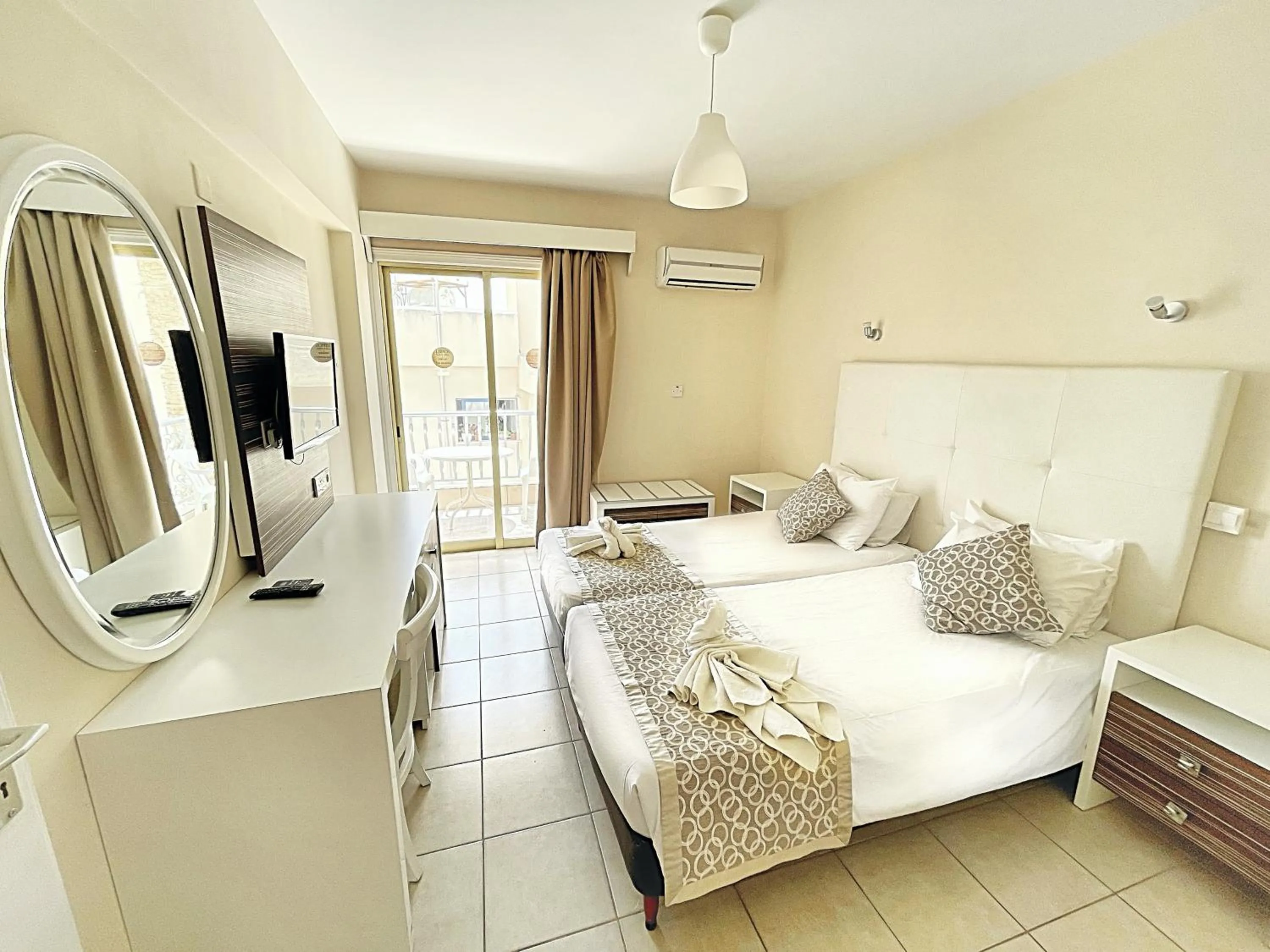 Bed in Antonis G. Hotel Apartments