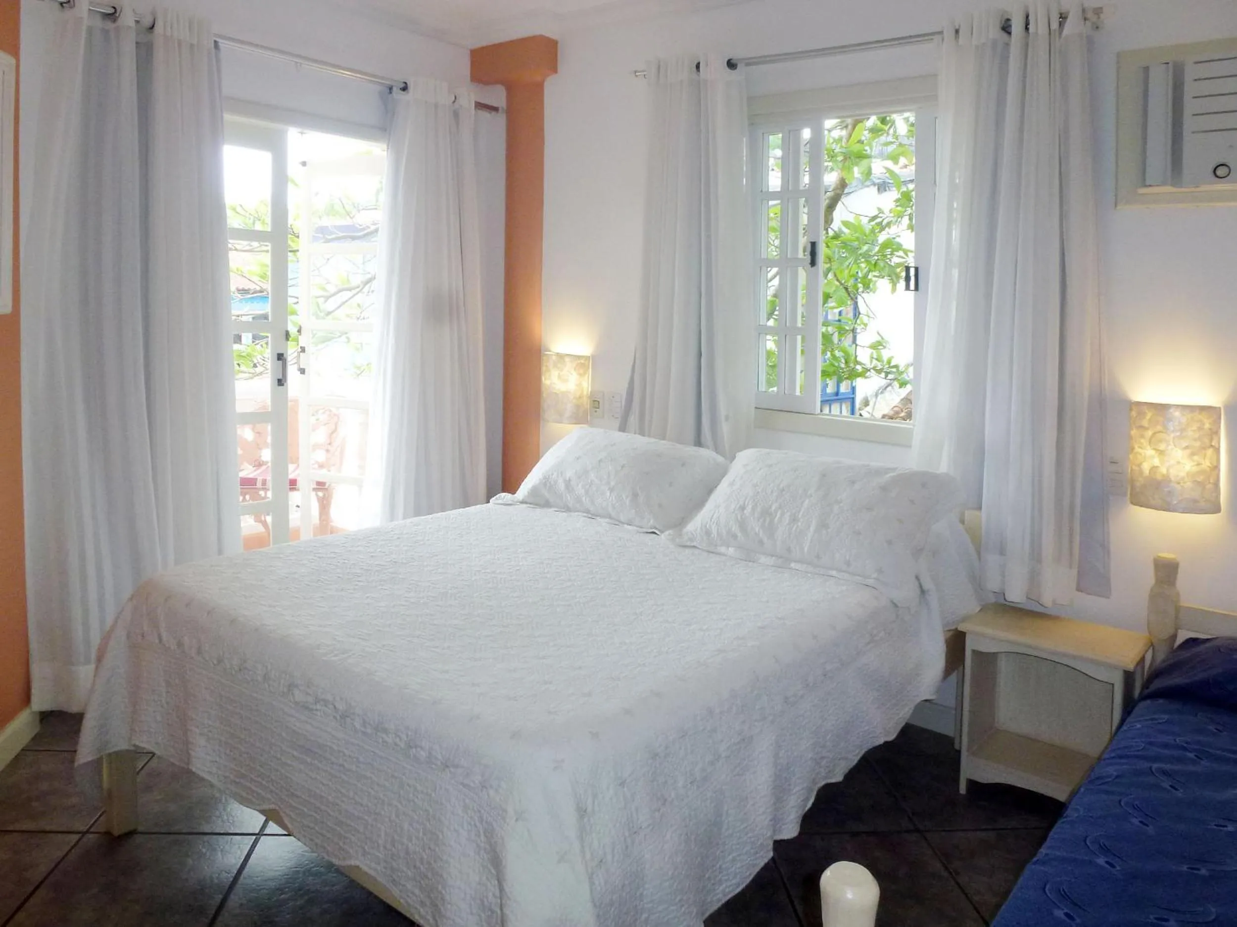 Bed in Pousada Casablanca