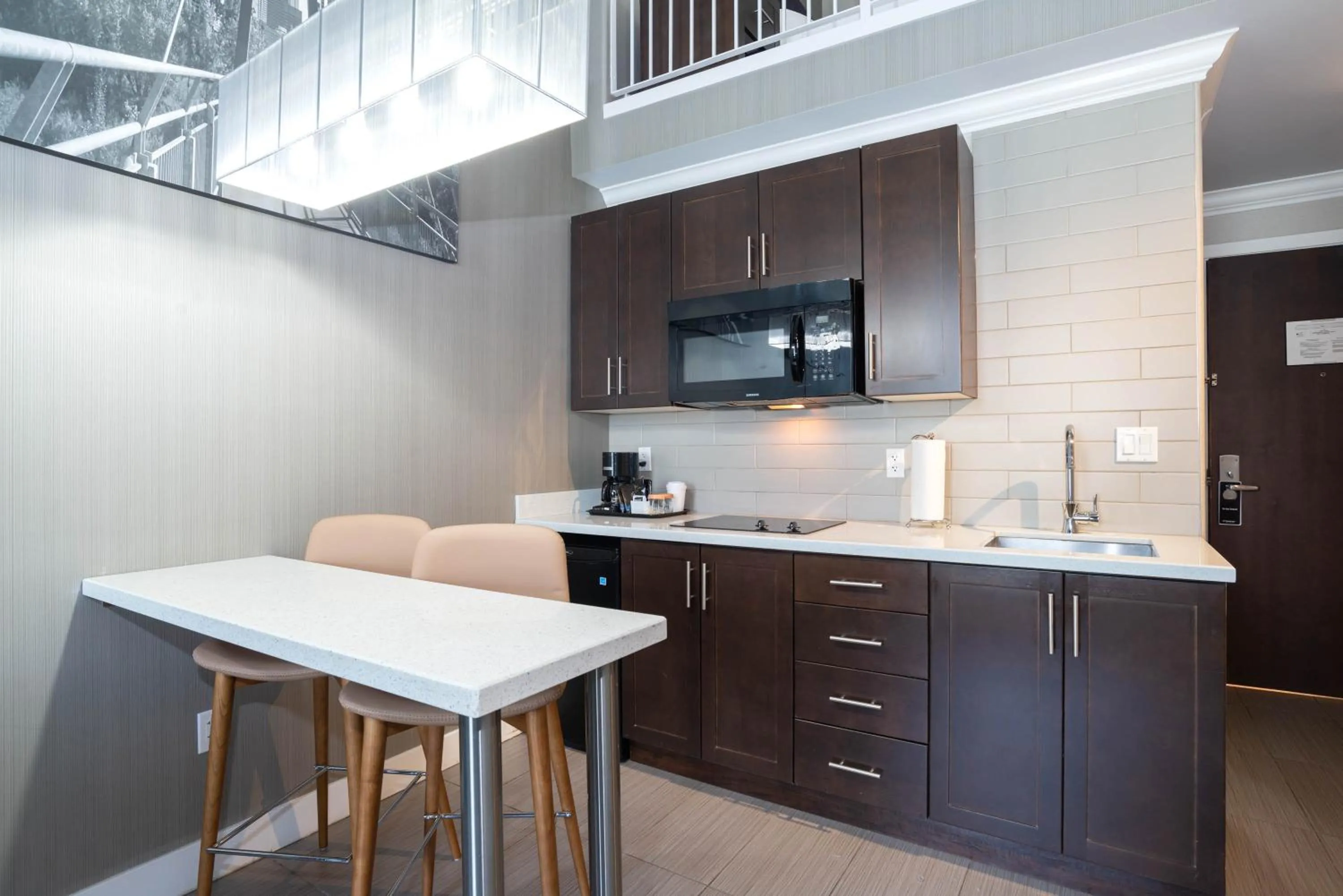 Kitchen or kitchenette in Sandman Hotel & Suites Calgary South