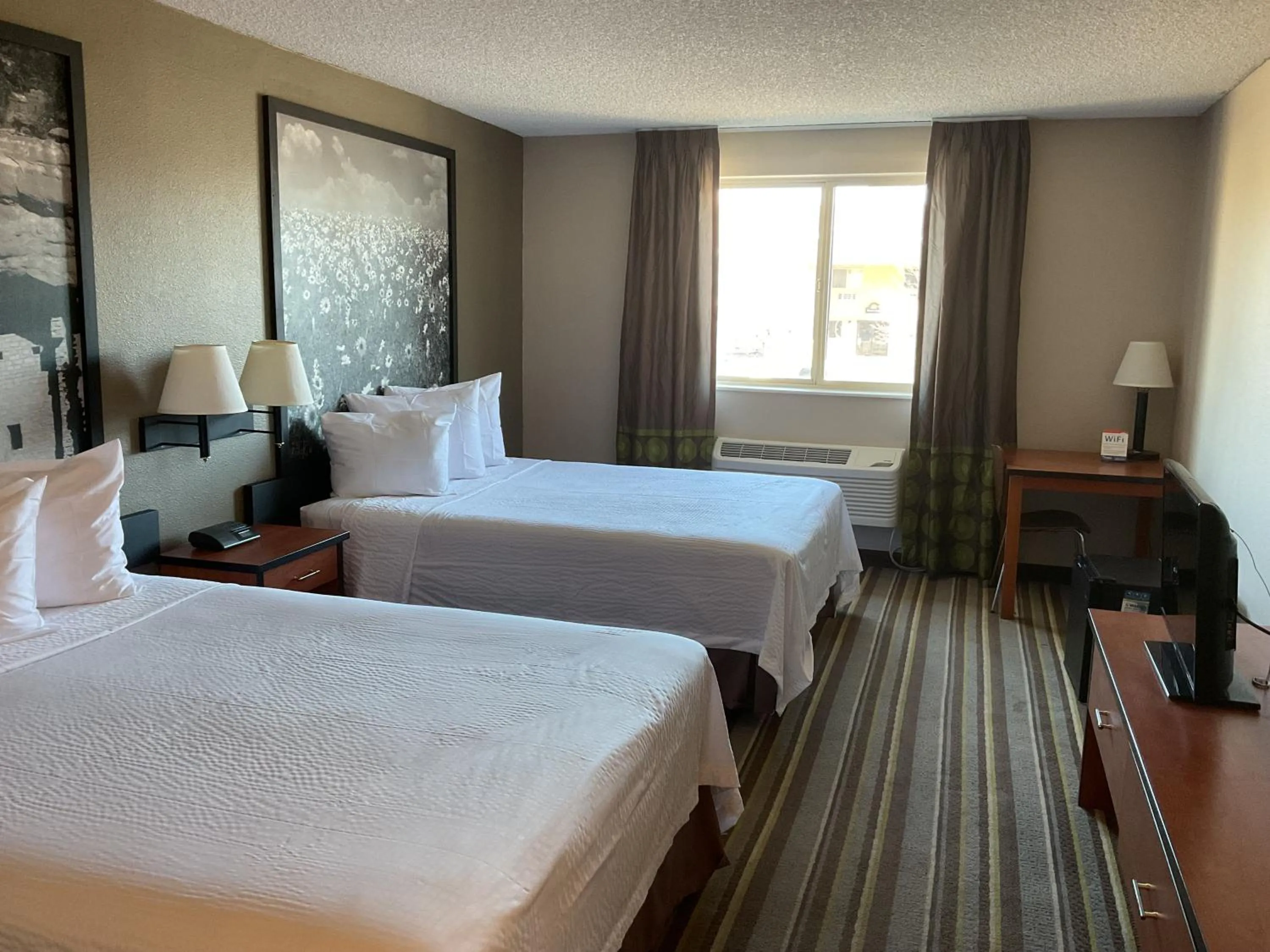 Bed in Super 8 by Wyndham Colorado Springs Airport
