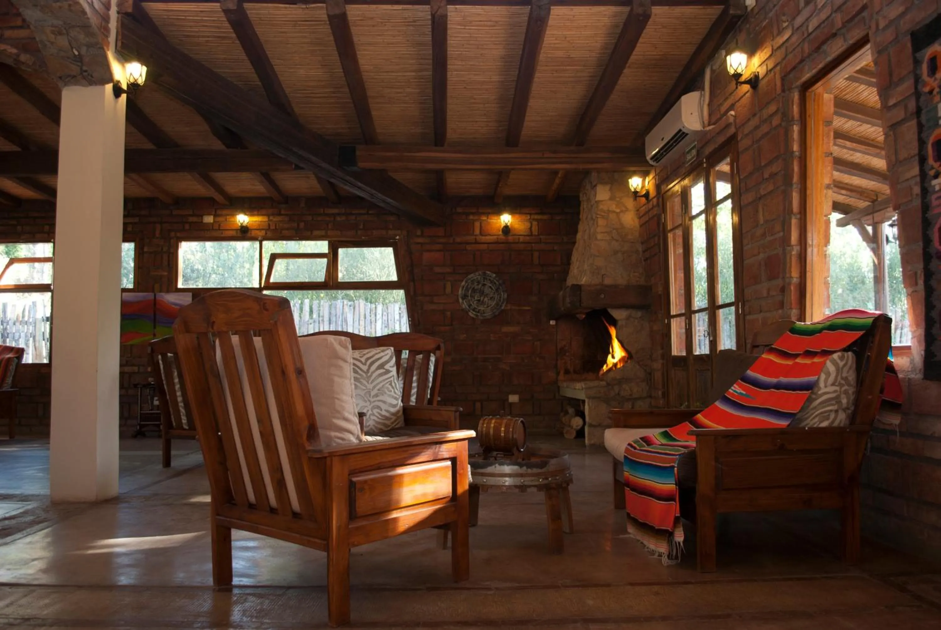 Communal lounge/ TV room in Posada Boutique El Encuentro Chacras de Coria