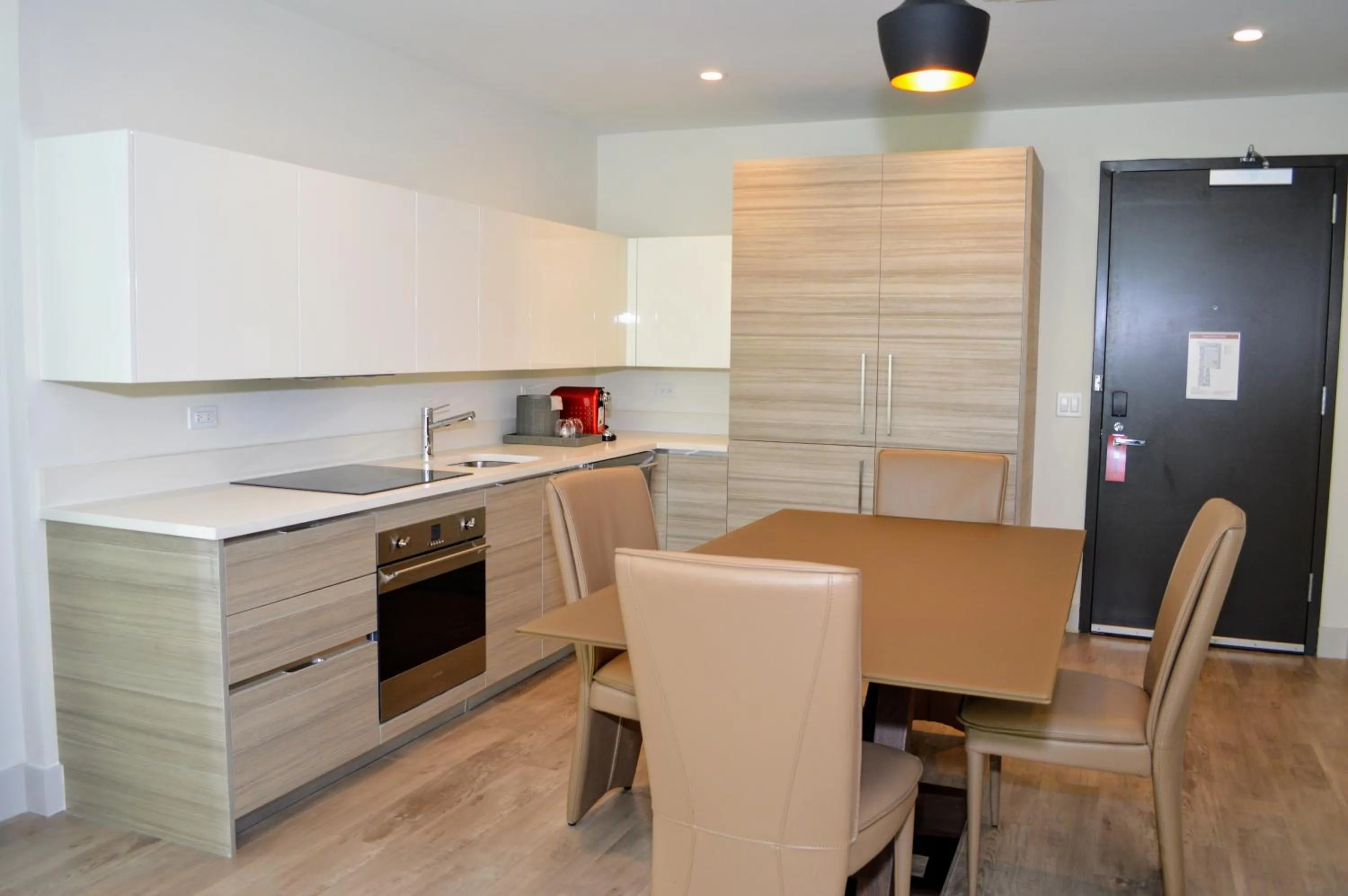 Kitchen or kitchenette in CH Luxury Condos & Studios On The Beach