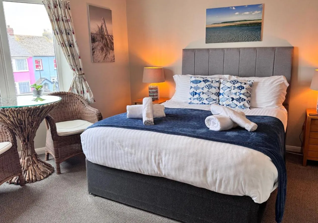 Bed in The Waterfront Inn