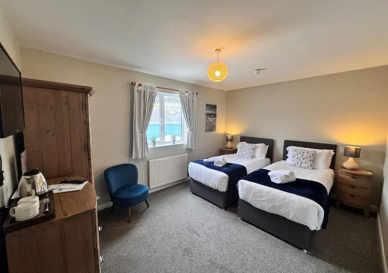 Standard Twin Room with Garden View in The Waterfront Inn Standard Twin Room with Garden View in The Waterfront Inn