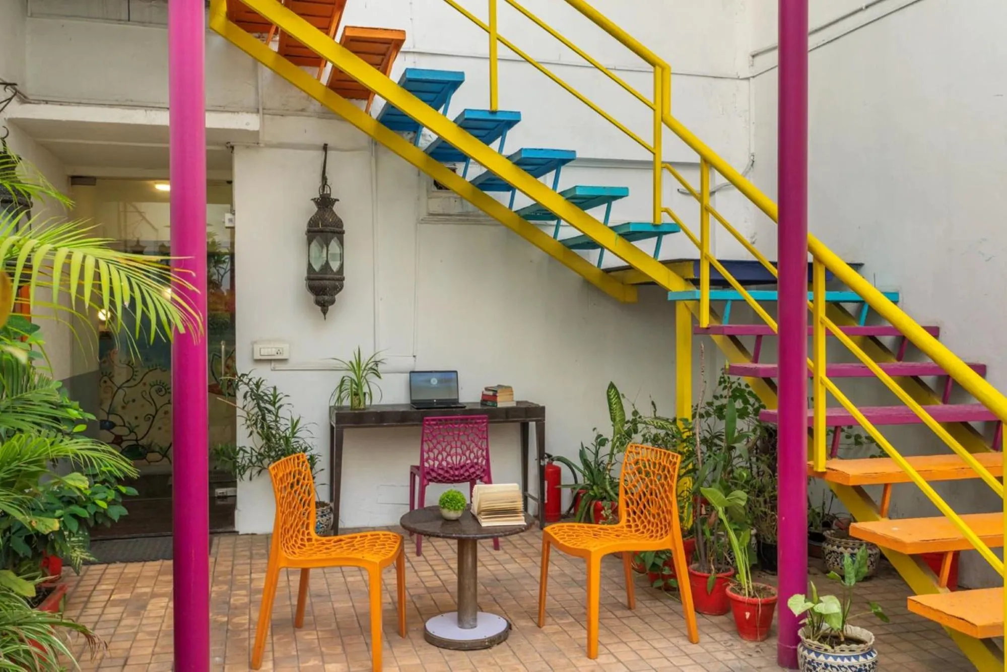 Seating area in goSTOPS Delhi - Private Rooms & Dorms