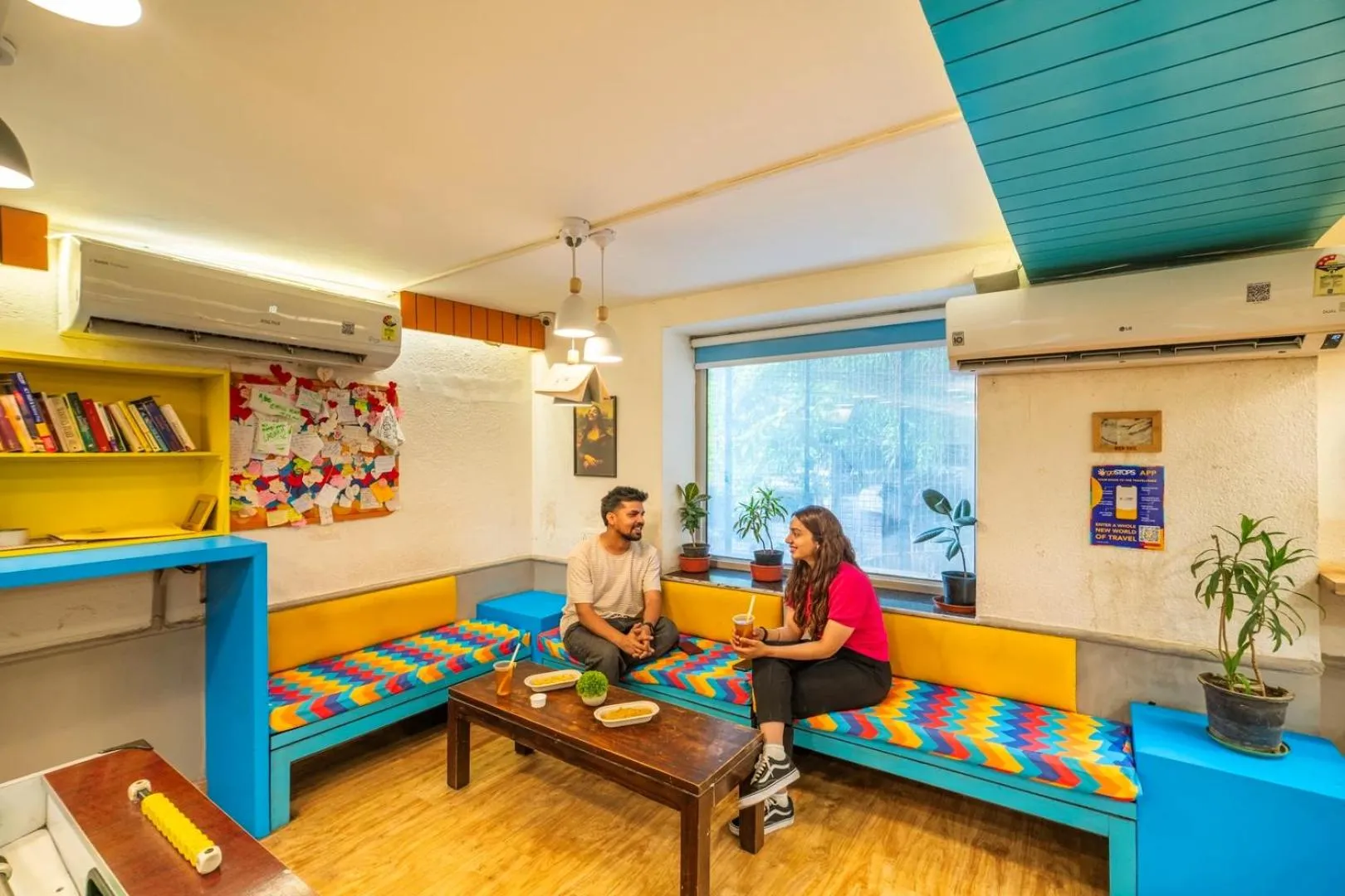 Seating area in goSTOPS Delhi - Private Rooms & Dorms