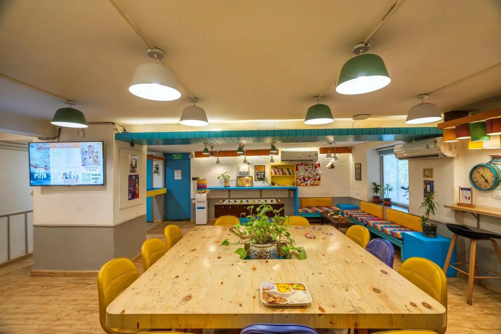 Seating area in goSTOPS Delhi - Private Rooms & Dorms