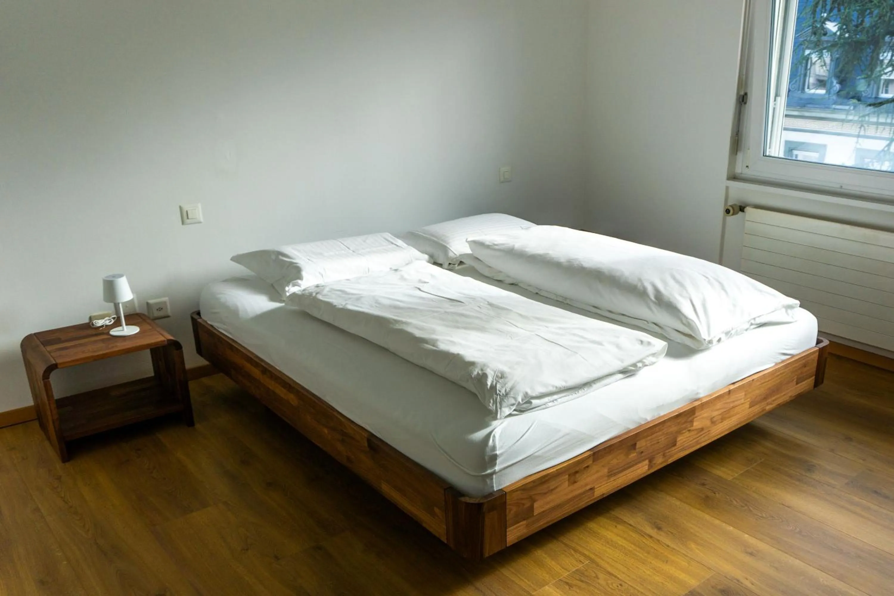 Bed in Hotel La Balance self check-in