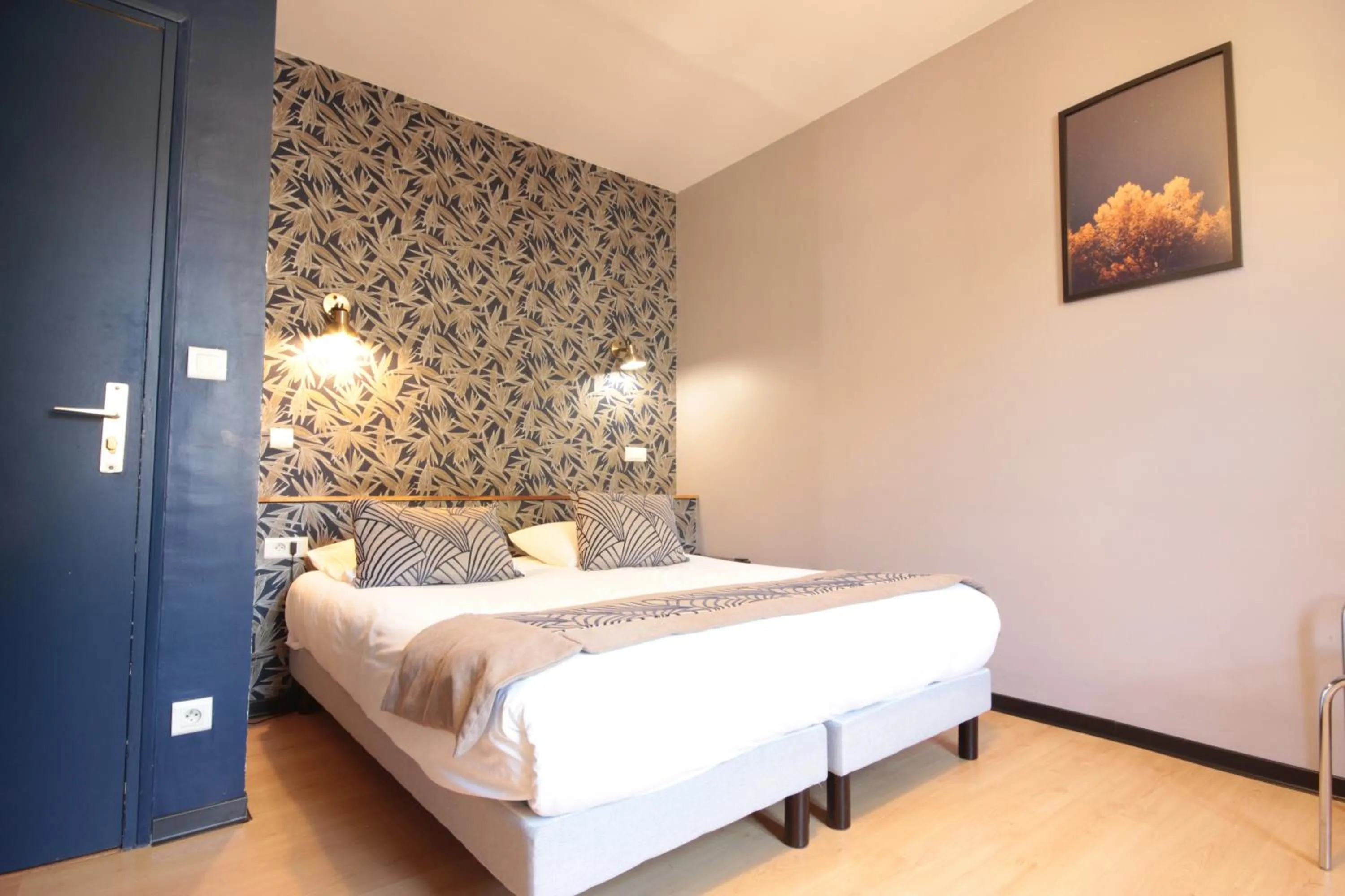 Bed in Hôtel Des Arts, Artisanal et Indépendant