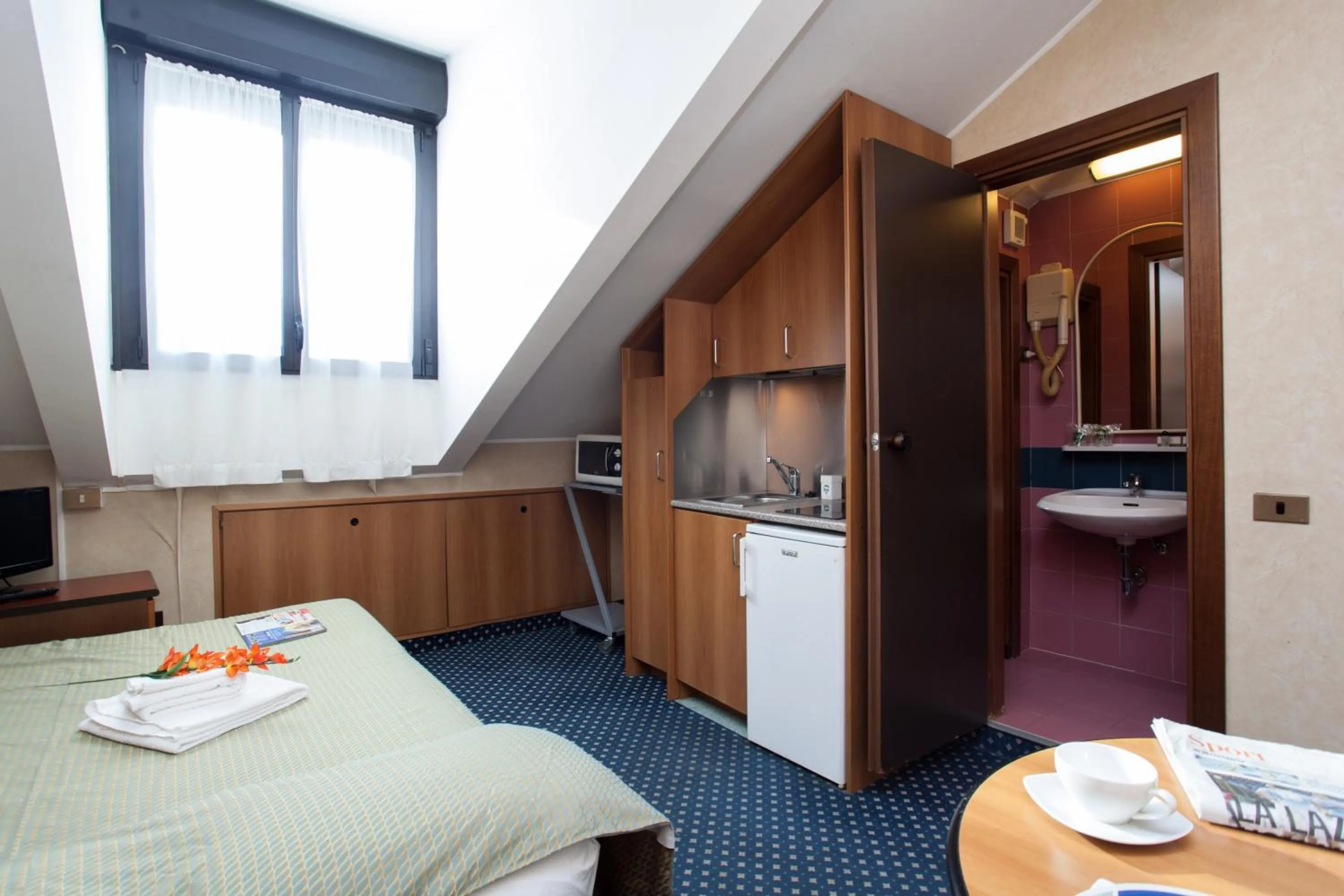 Photo of the whole room, Bed in Residence Lepontina