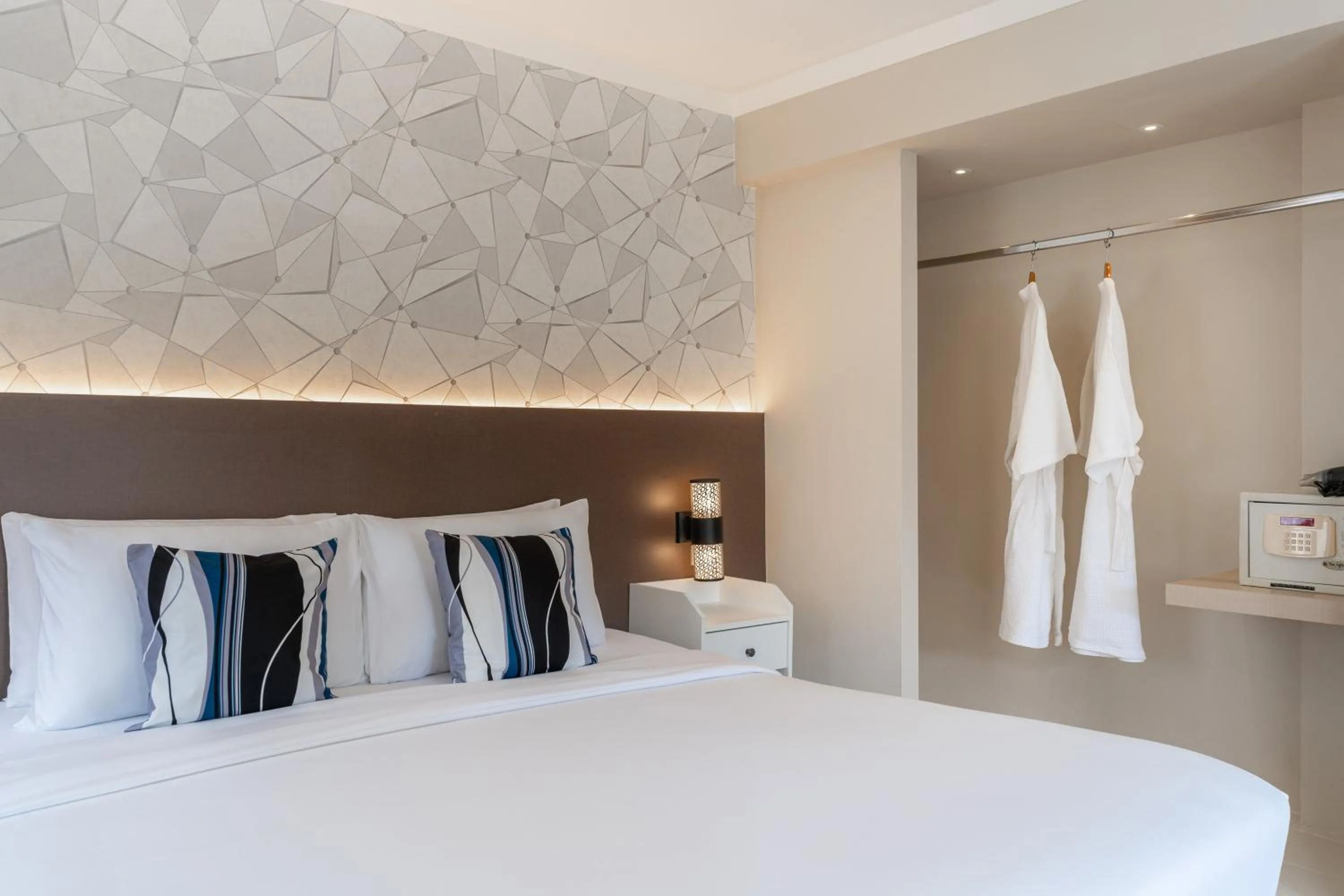 Bed in Heeton Concept Hotel Pattaya by Compass Hospitality