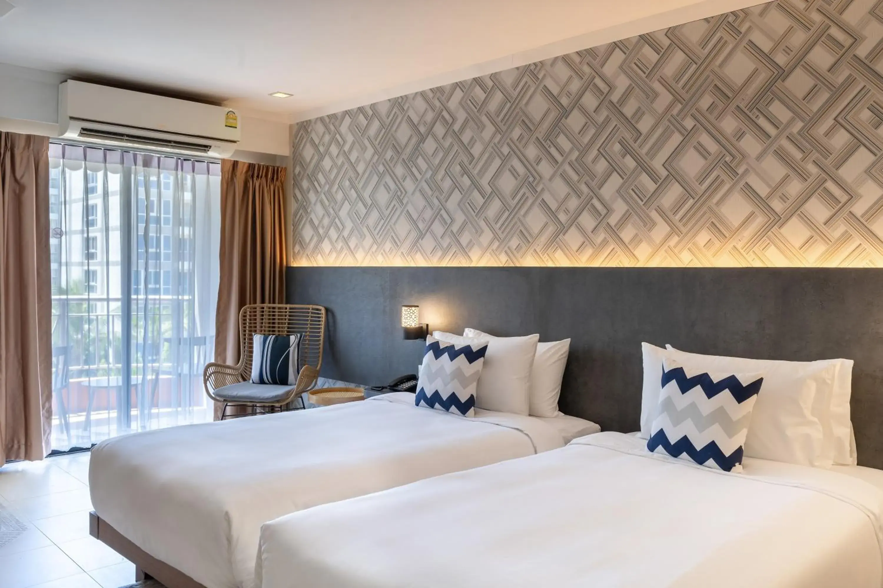 Superior Twin Beds with Balcony in Heeton Concept Hotel Pattaya by Compass Hospitality Superior Twin Beds with Balcony in Heeton Concept Hotel Pattaya by Compass Hospitality
