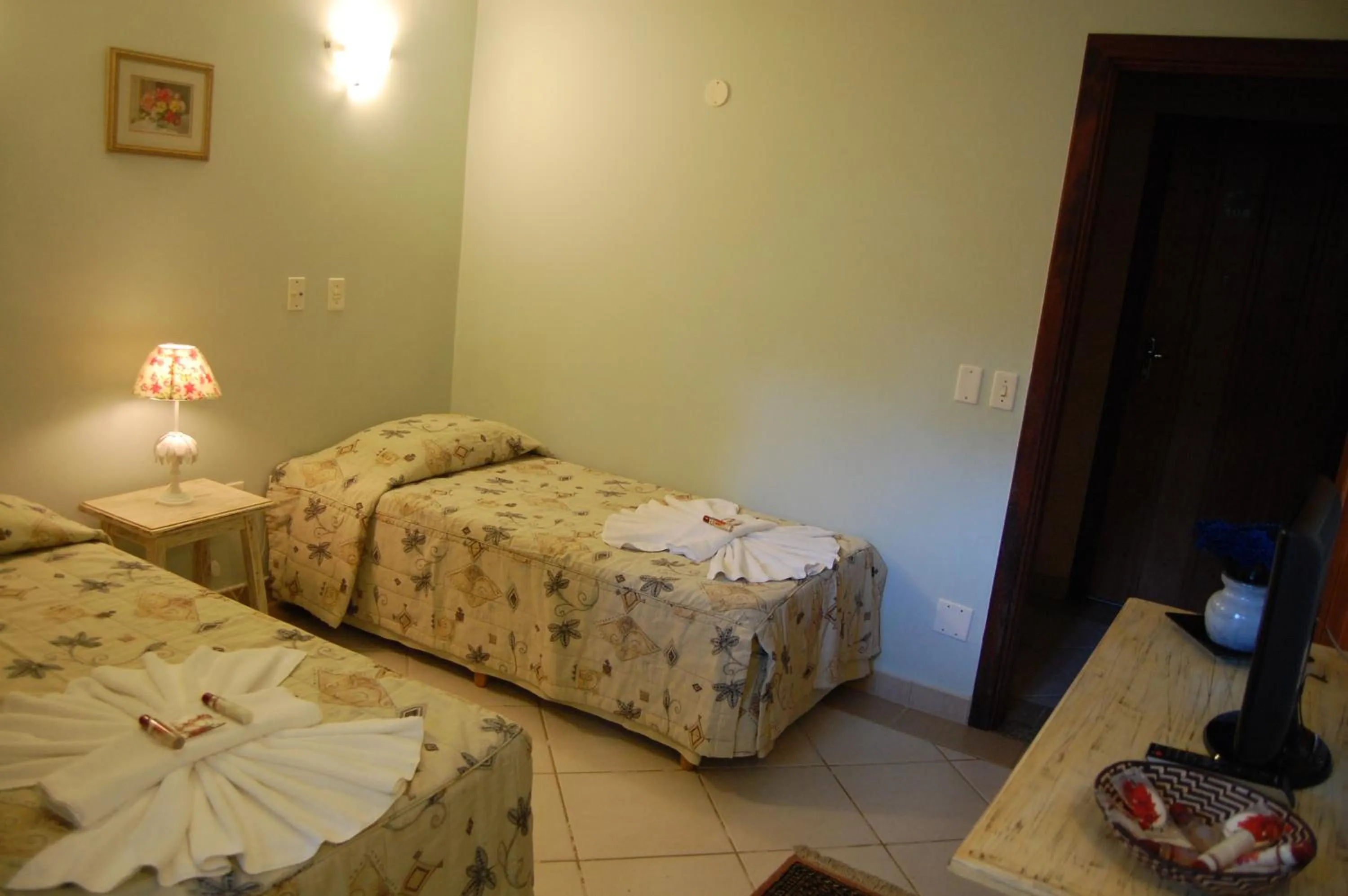 Photo of the whole room, Bed in Pousada Águas de Parati