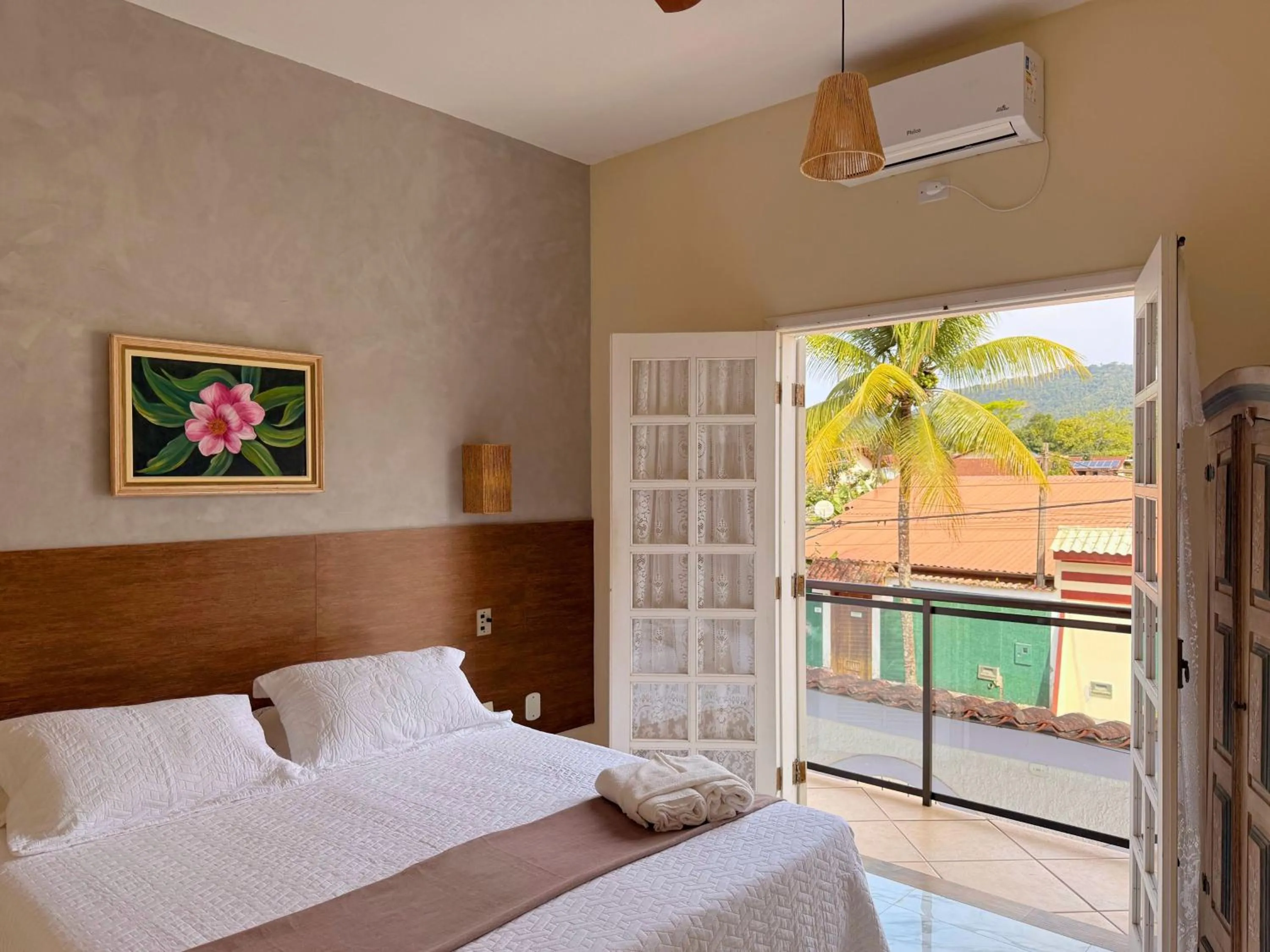 Bed in Pousada Larissa - com Gerador de Energia