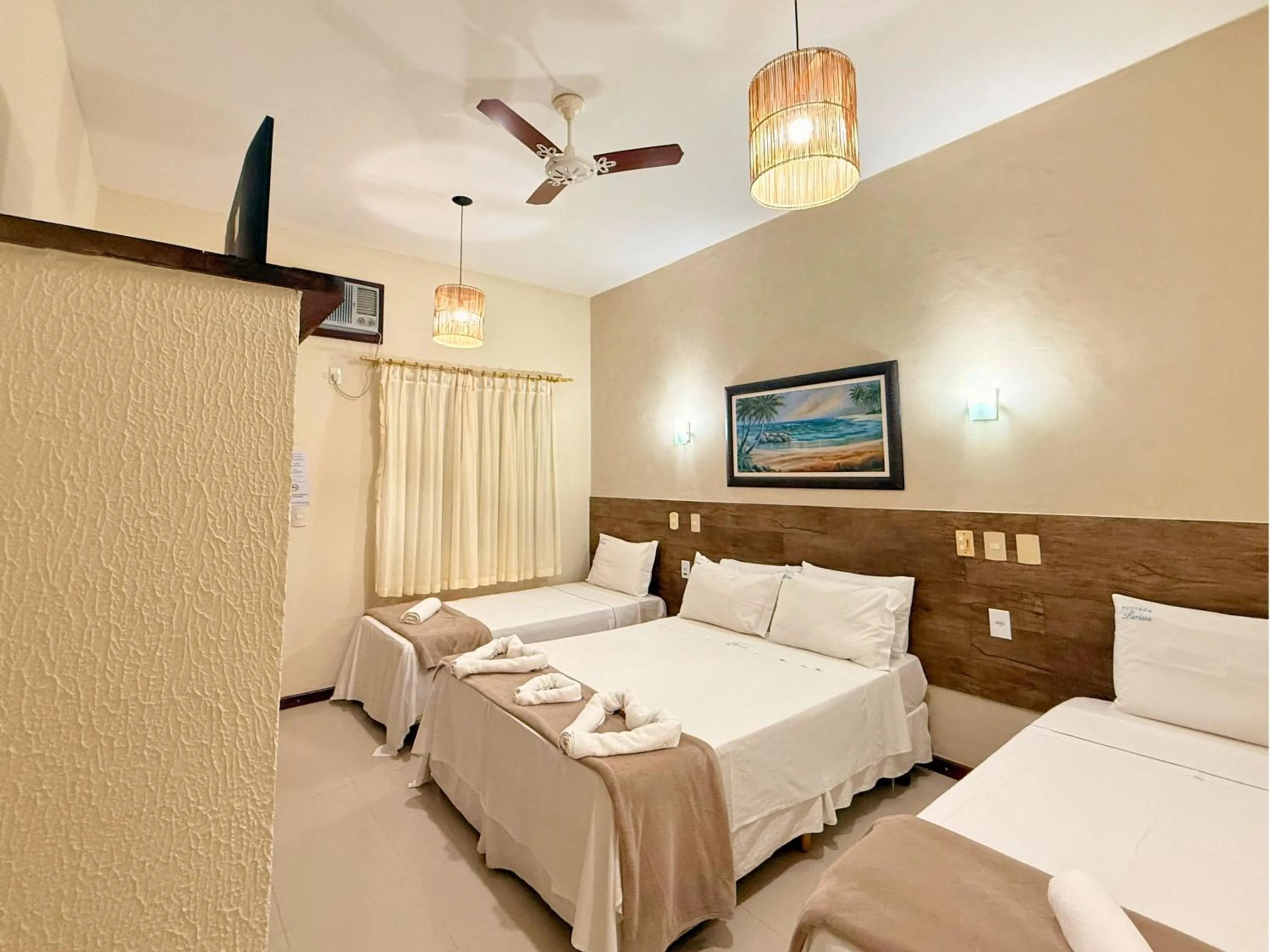 Bed in Pousada Larissa - com Gerador de Energia