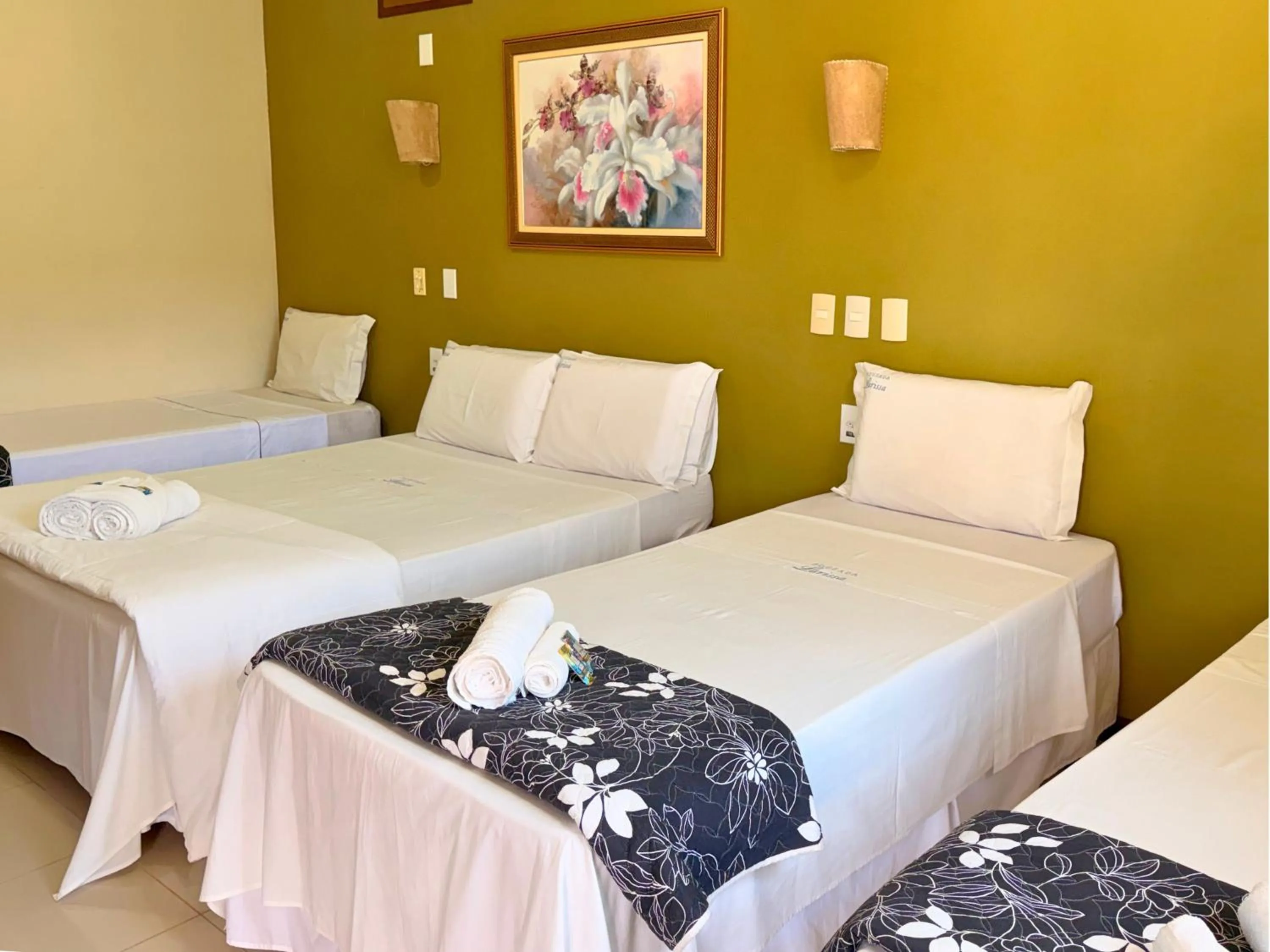 Bed in Pousada Larissa - com Gerador de Energia