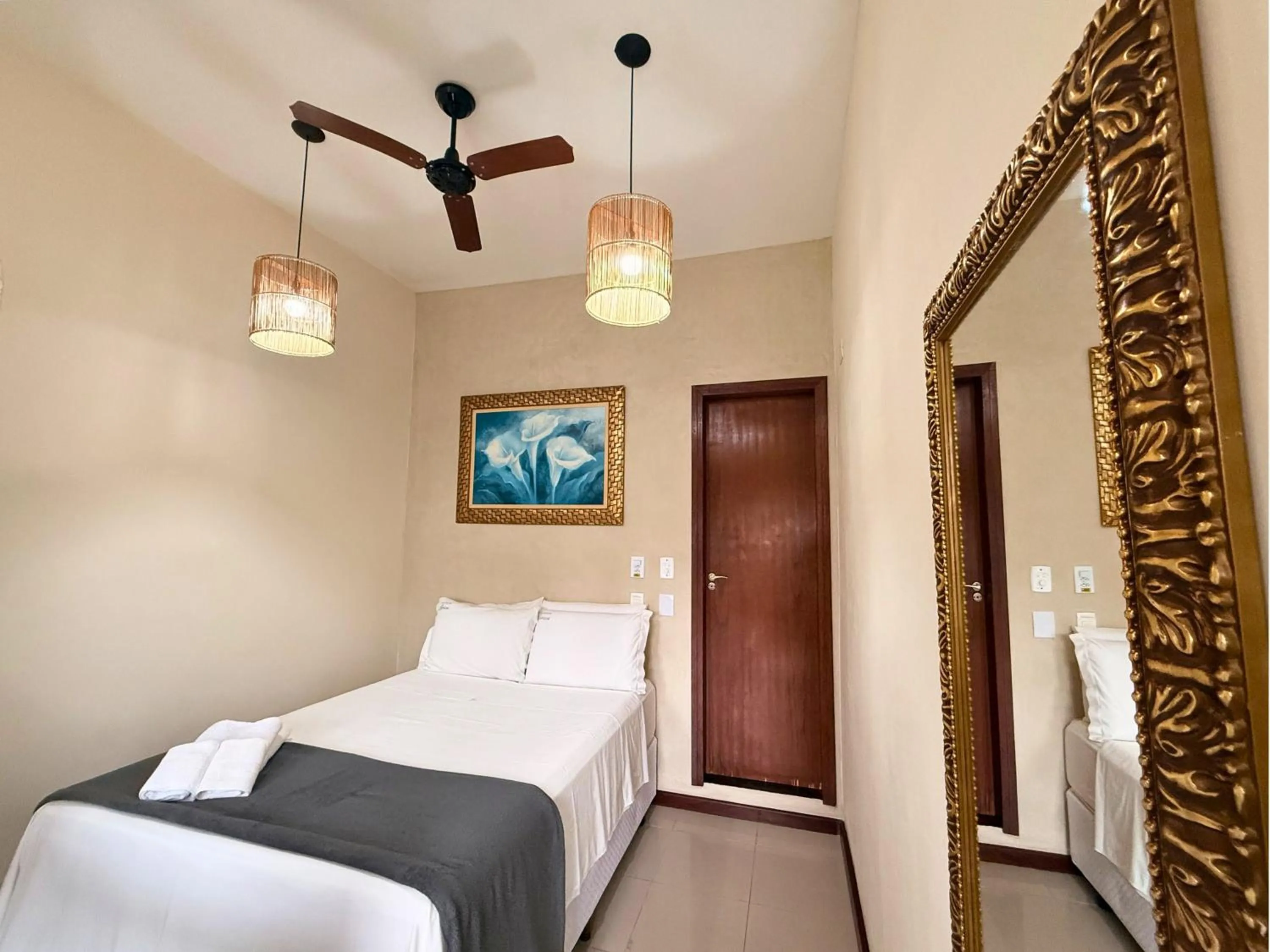 Bed in Pousada Larissa - com Gerador de Energia