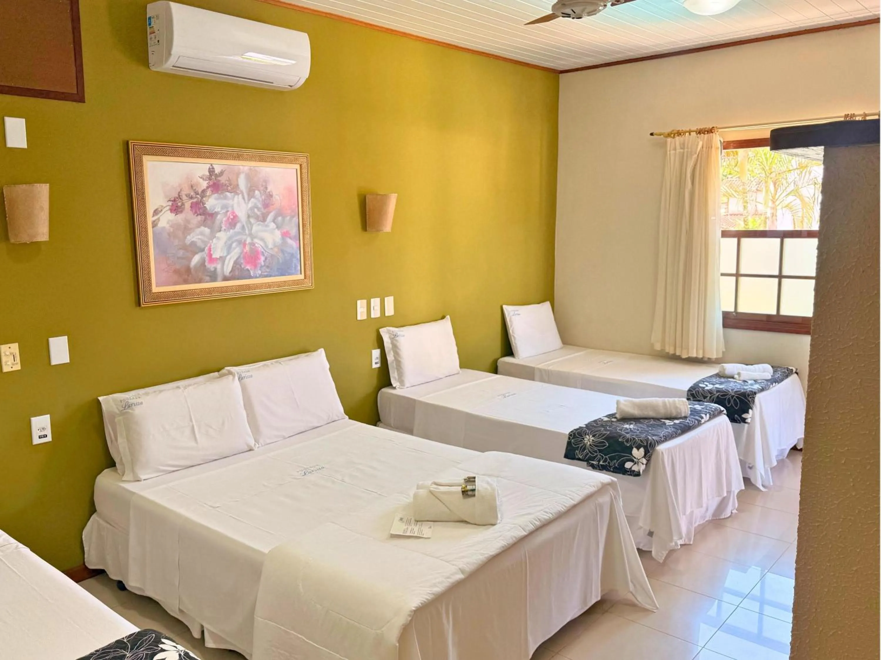 Bed in Pousada Larissa - com Gerador de Energia