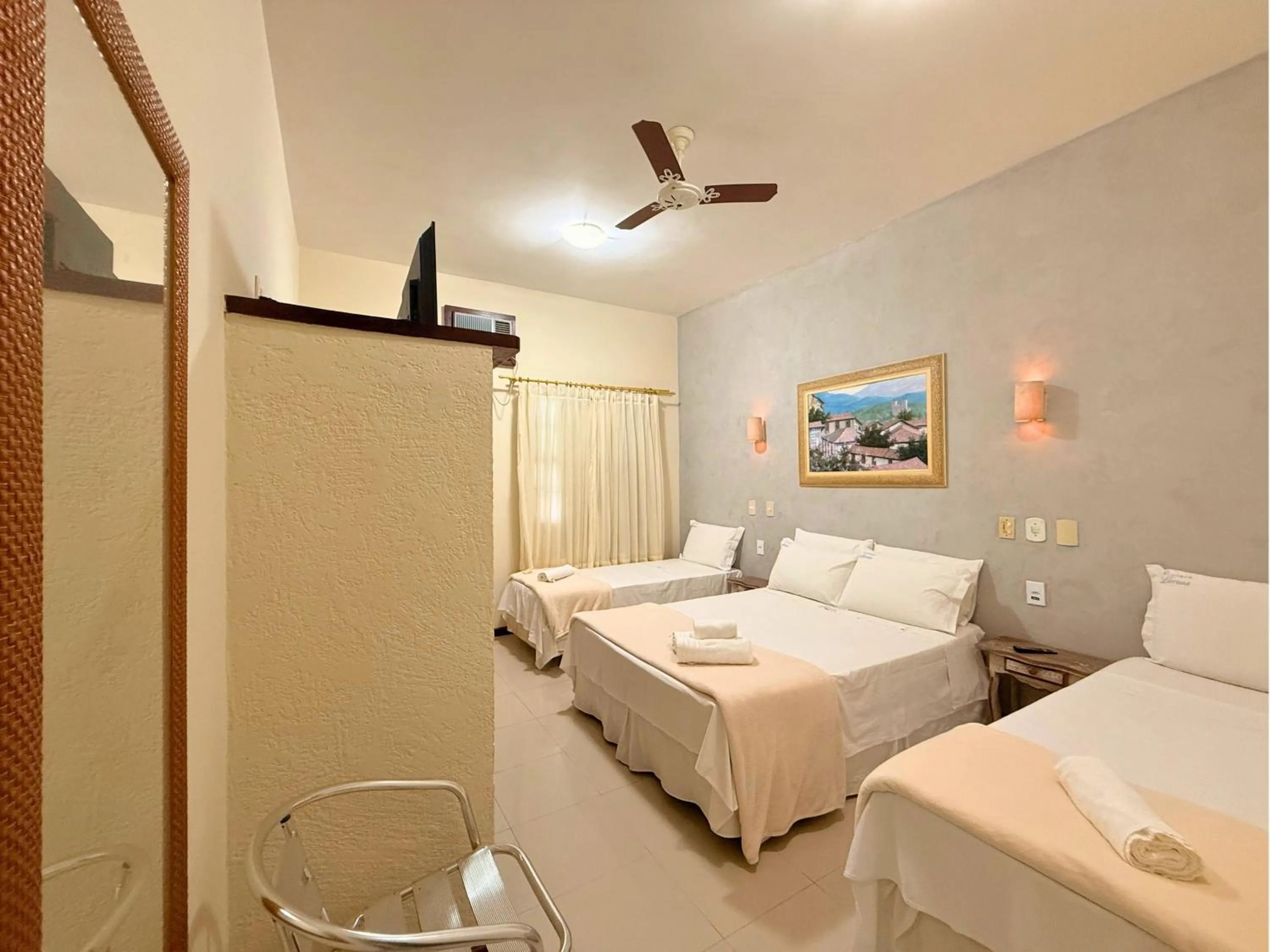 Bed in Pousada Larissa - com Gerador de Energia