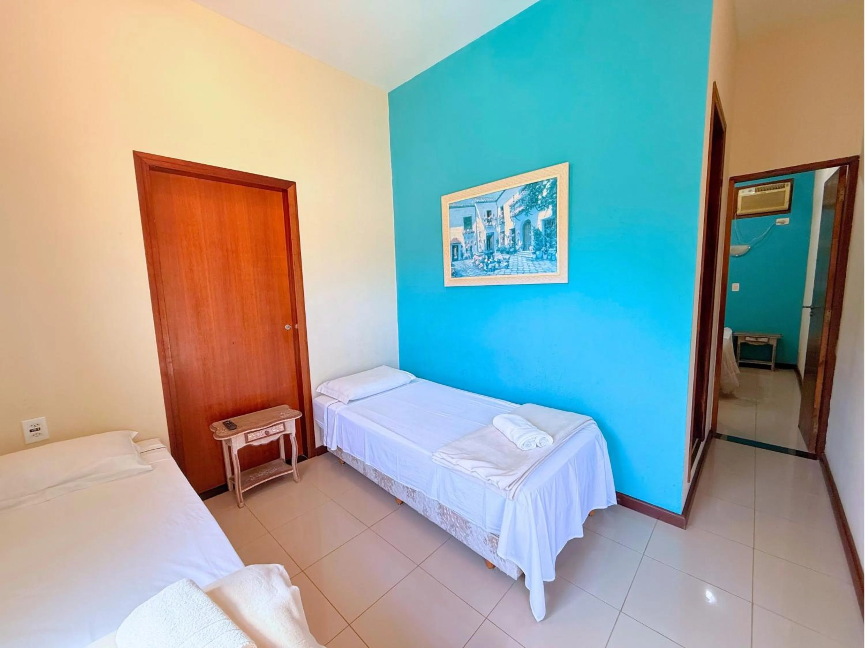 Bed in Pousada Larissa - com Gerador de Energia