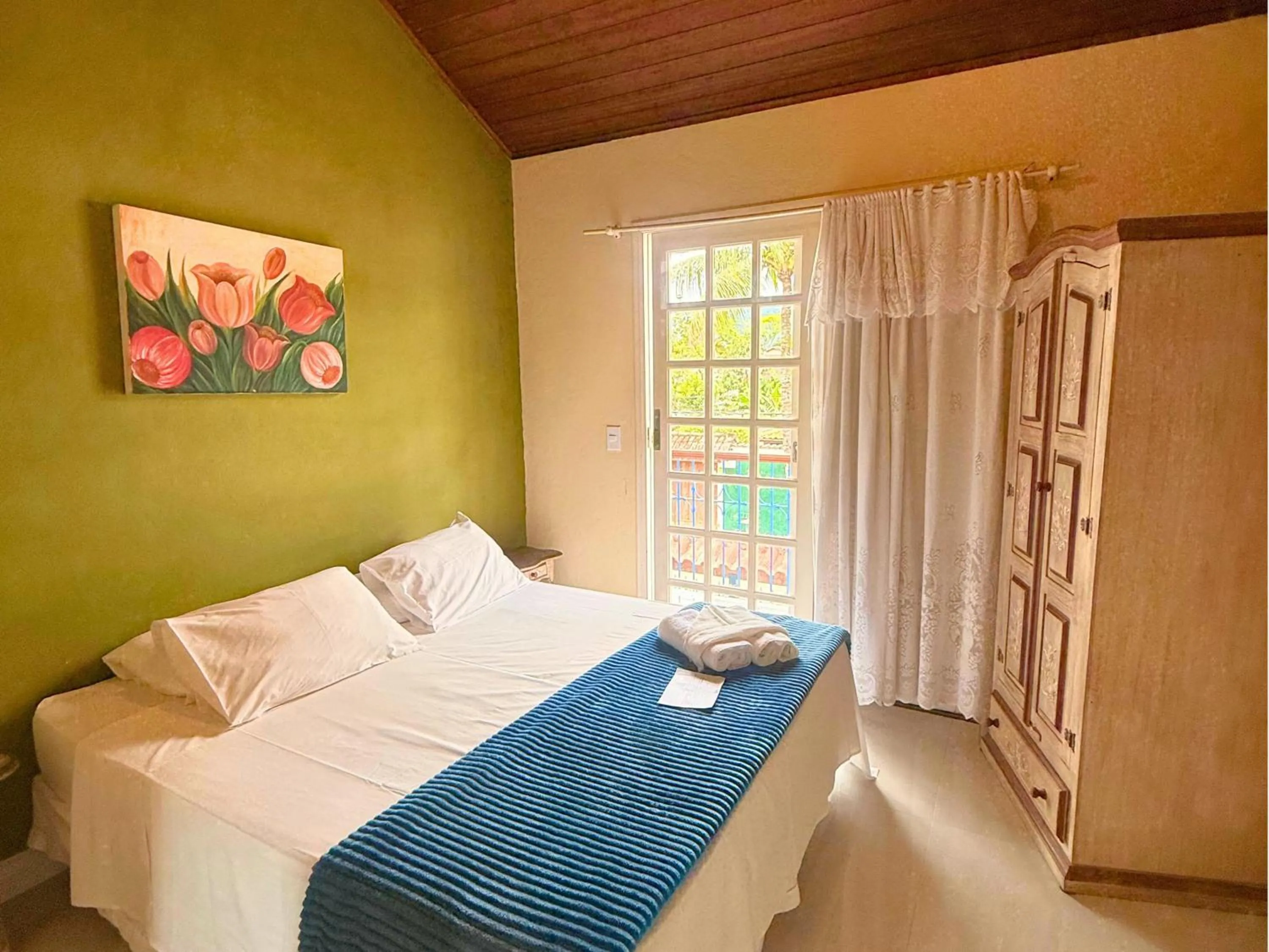 Bed in Pousada Larissa - com Gerador de Energia