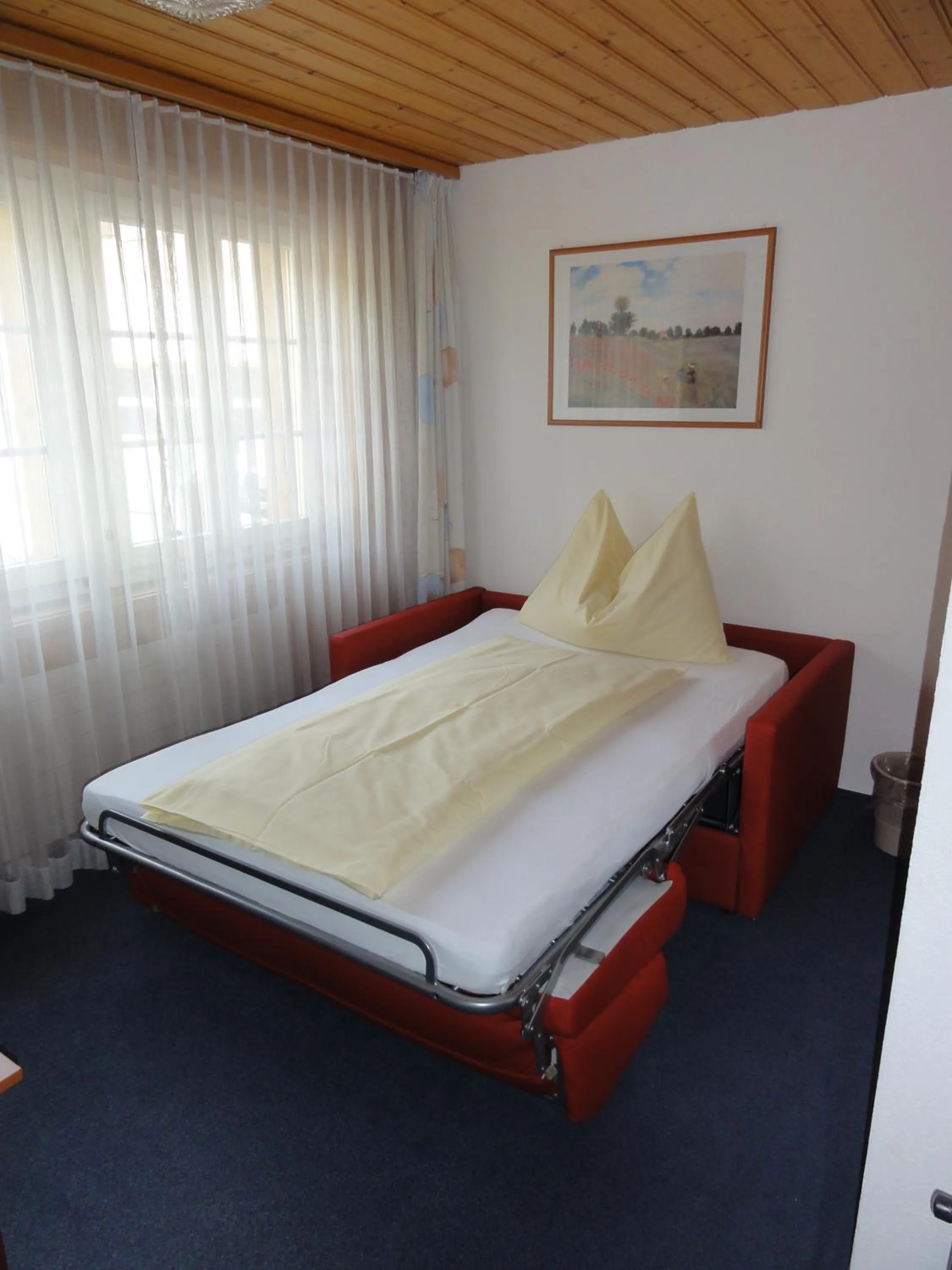 Bed in Hotel Steinbock Grindelwald