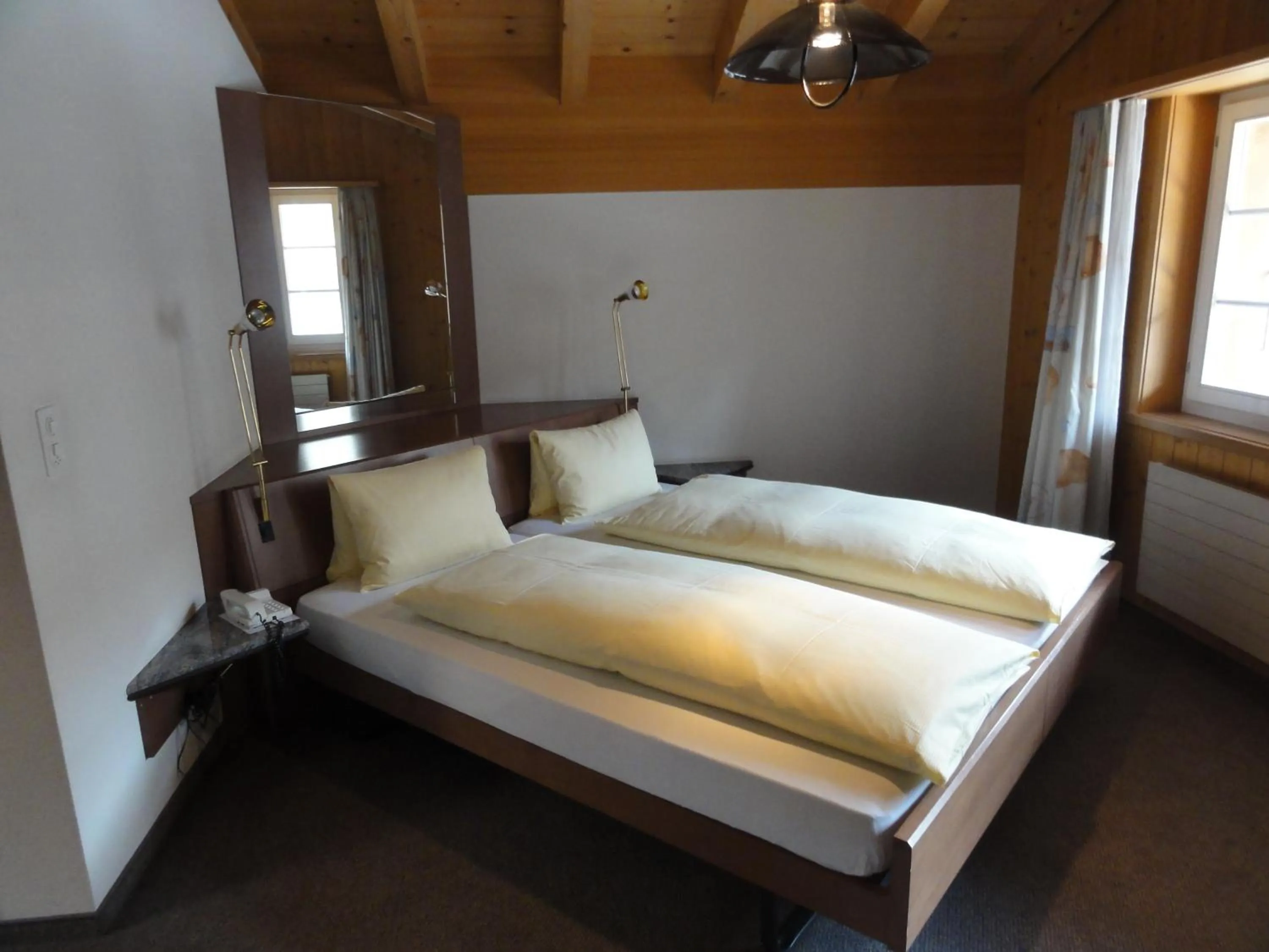 Bed in Hotel Steinbock Grindelwald