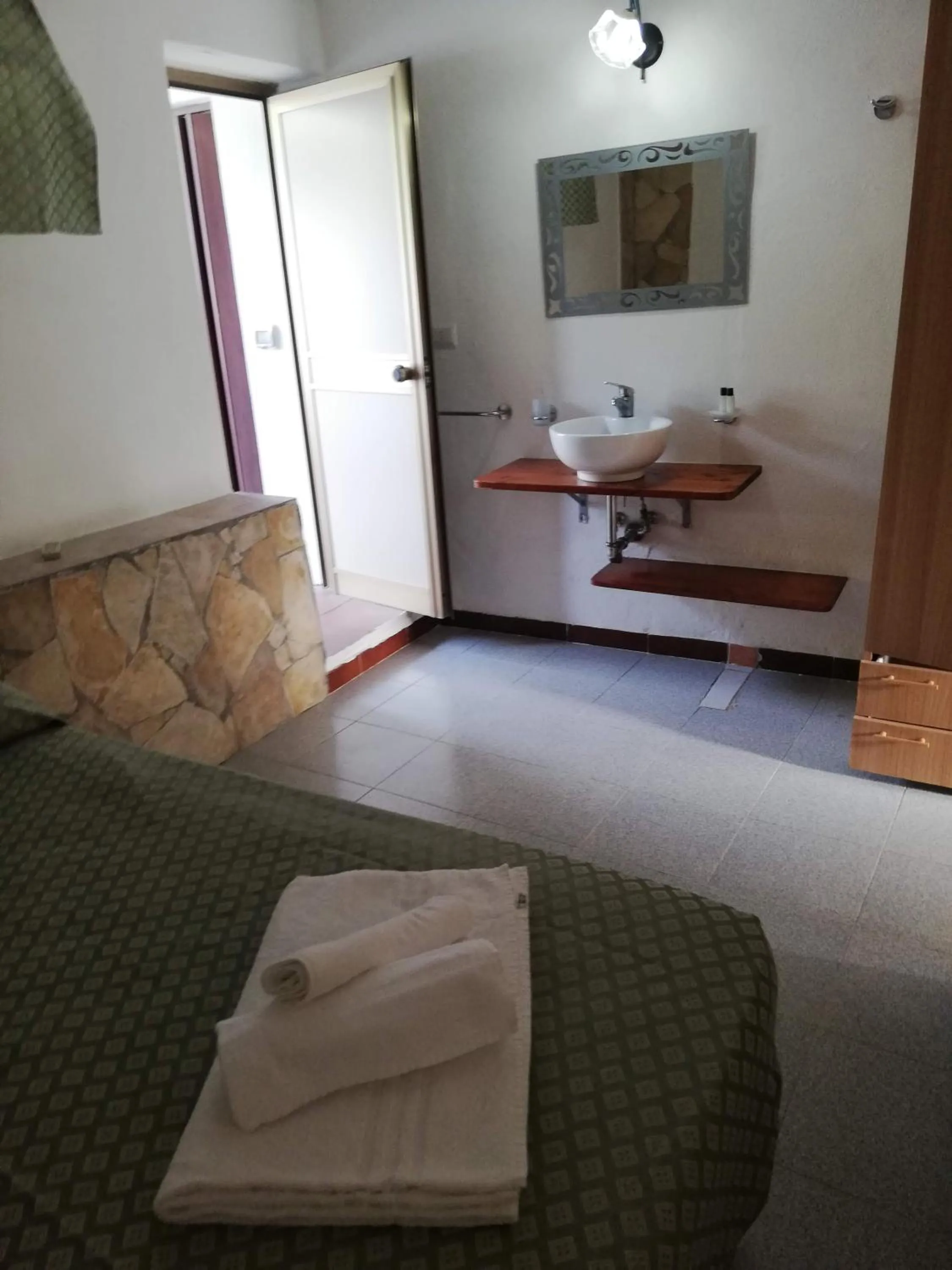 Photo of the whole room, Bed in Hotel Villaggio Tabù