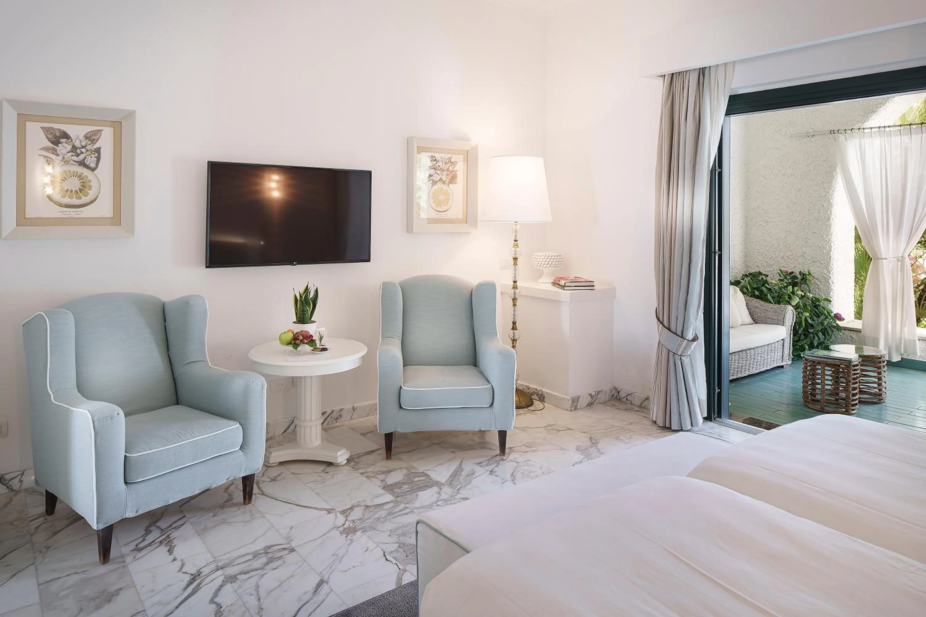 Patio, Bed in Botania Relais & Spa - The Leading Hotels of the World