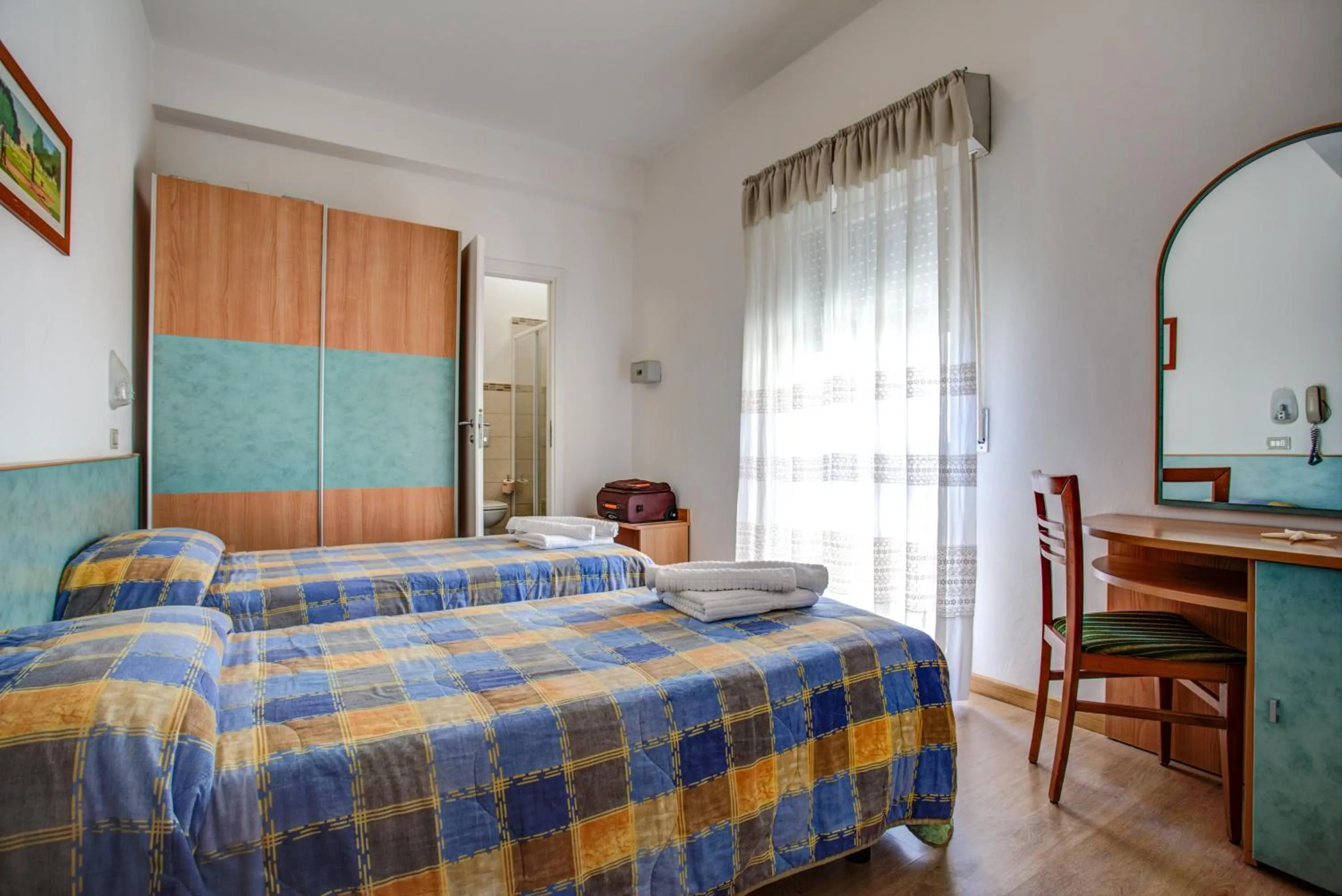 Bed in Hotel Tiziana