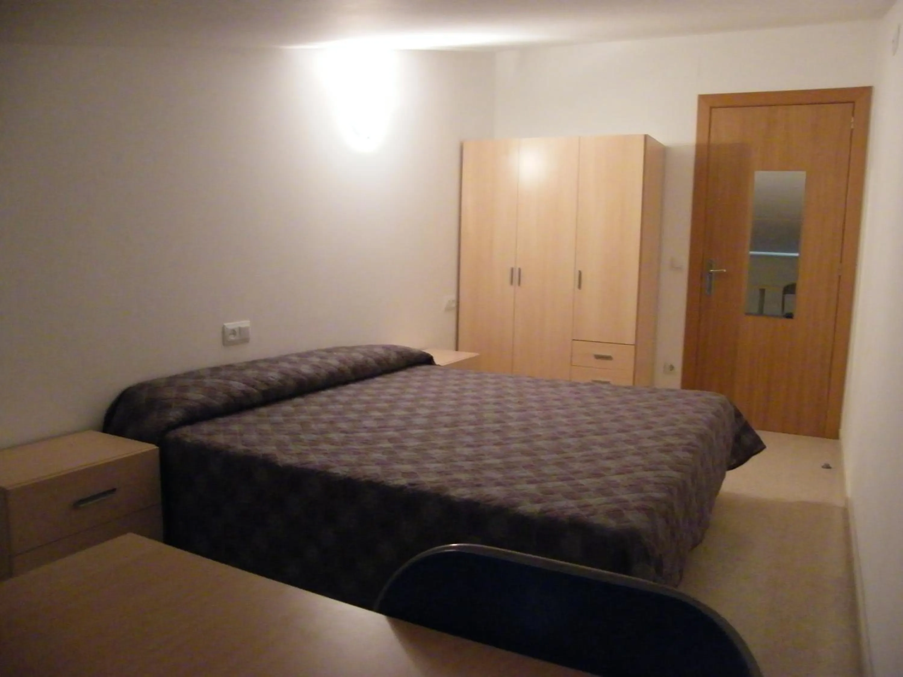 Photo of the whole room, Bed in Amolls Restaurant i Habitacions