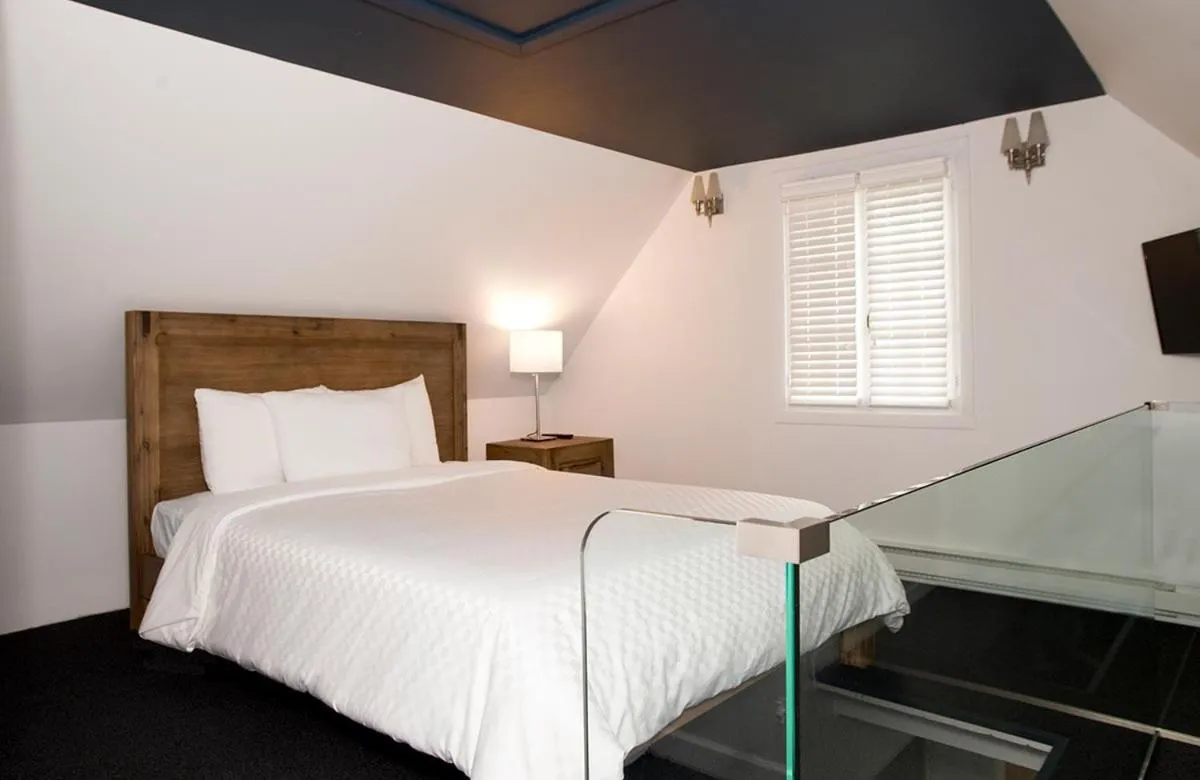 Bed in Hôtel Le Rivage