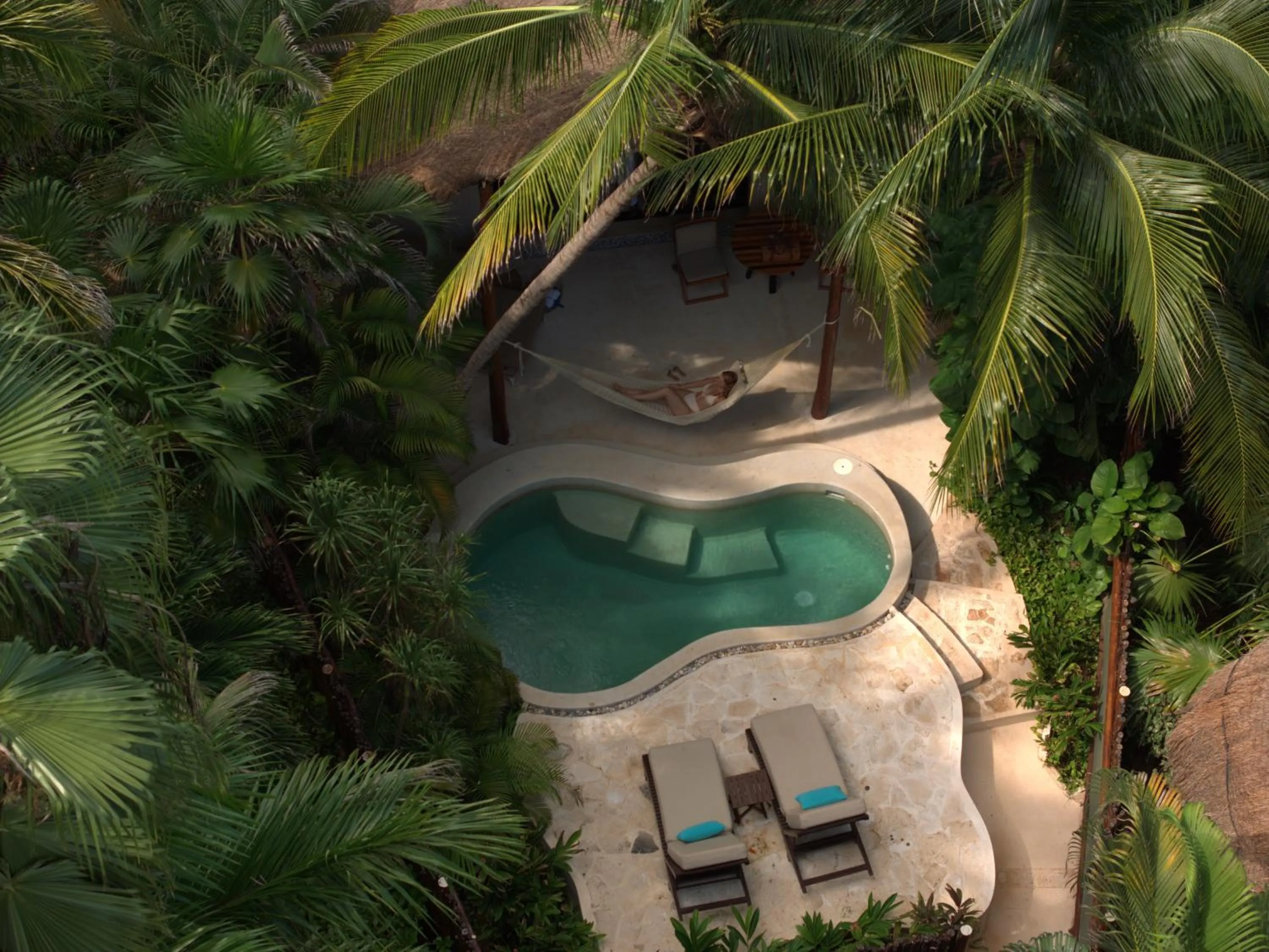 Swimming pool in Viceroy Riviera Maya, a Luxury Villa Resort