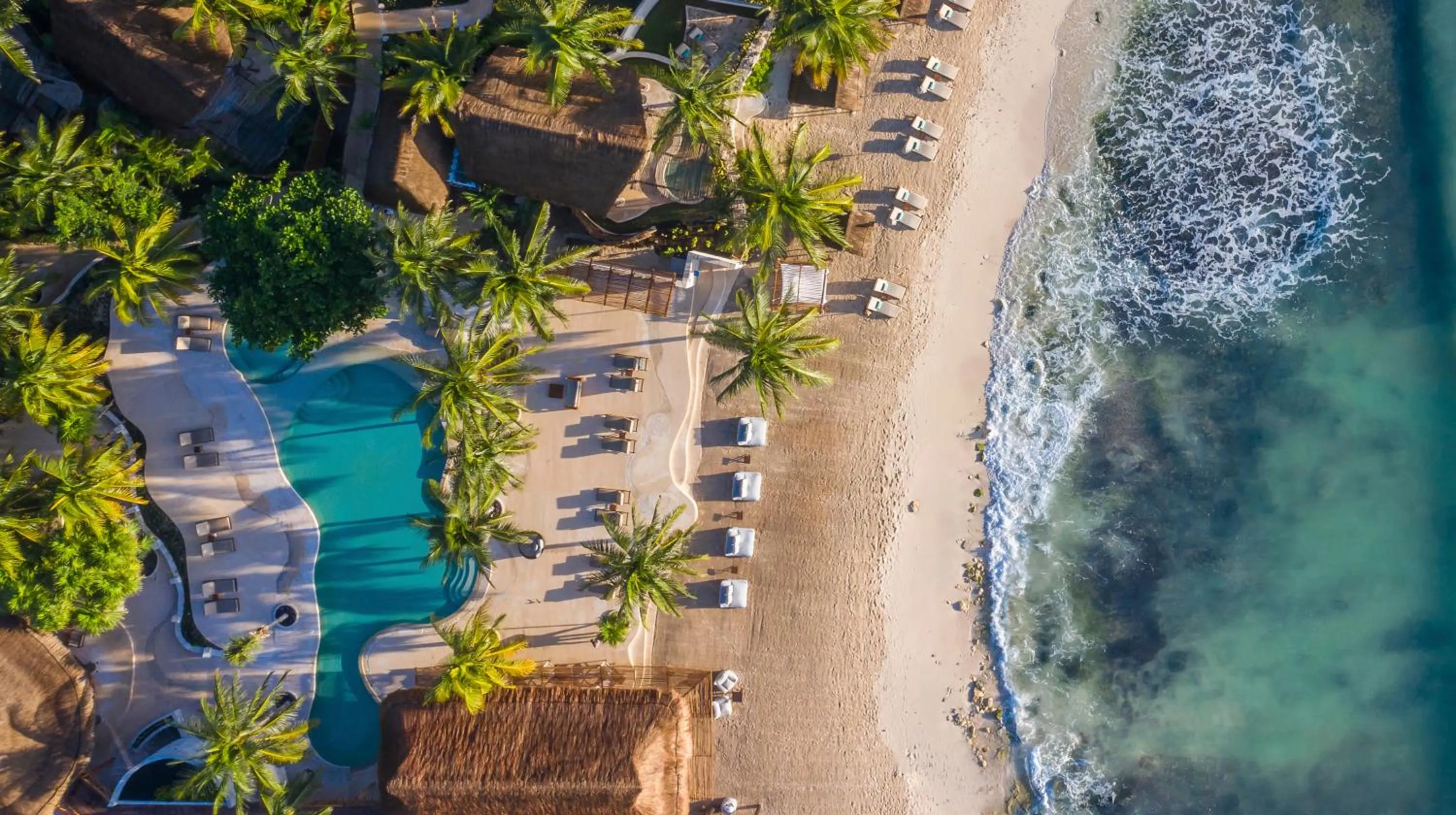 Swimming pool in Viceroy Riviera Maya, a Luxury Villa Resort