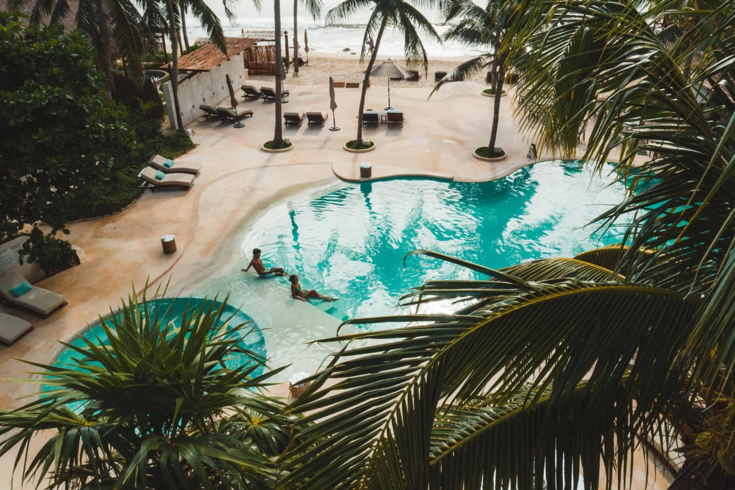 Swimming pool in Viceroy Riviera Maya, a Luxury Villa Resort