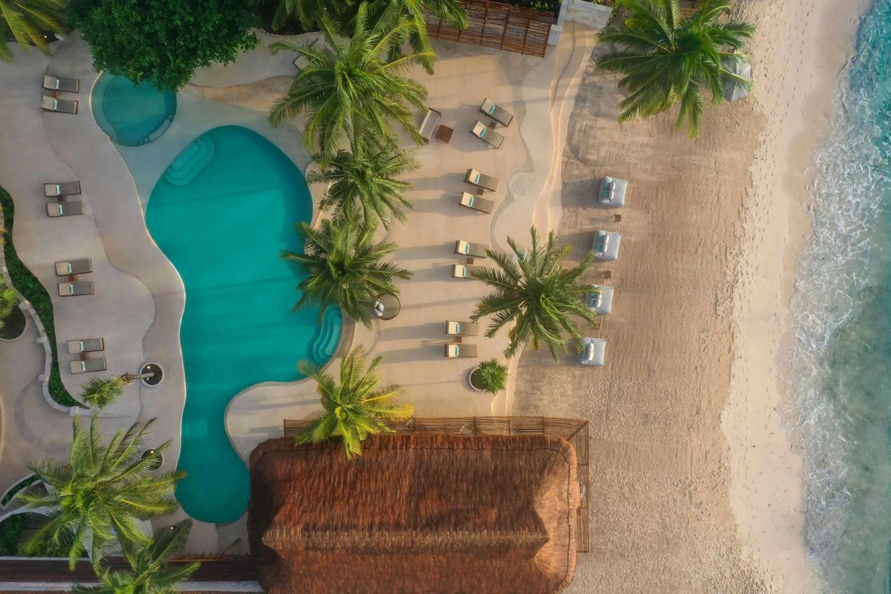 Swimming pool in Viceroy Riviera Maya, a Luxury Villa Resort
