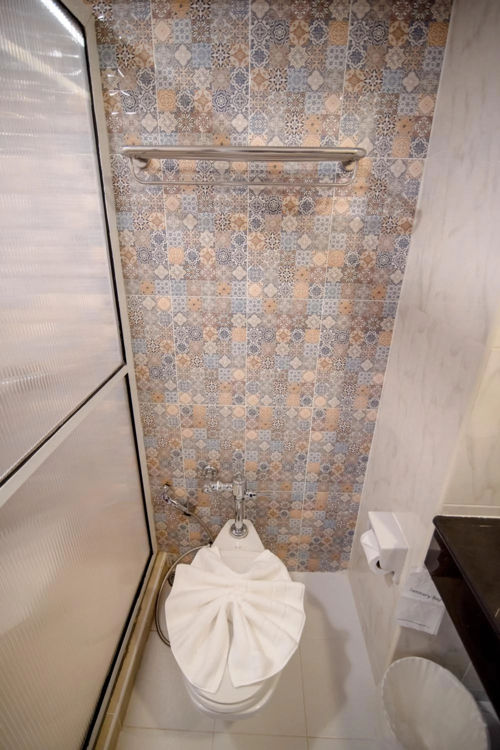 Bathroom in New Travel Beach Hotel & Resort