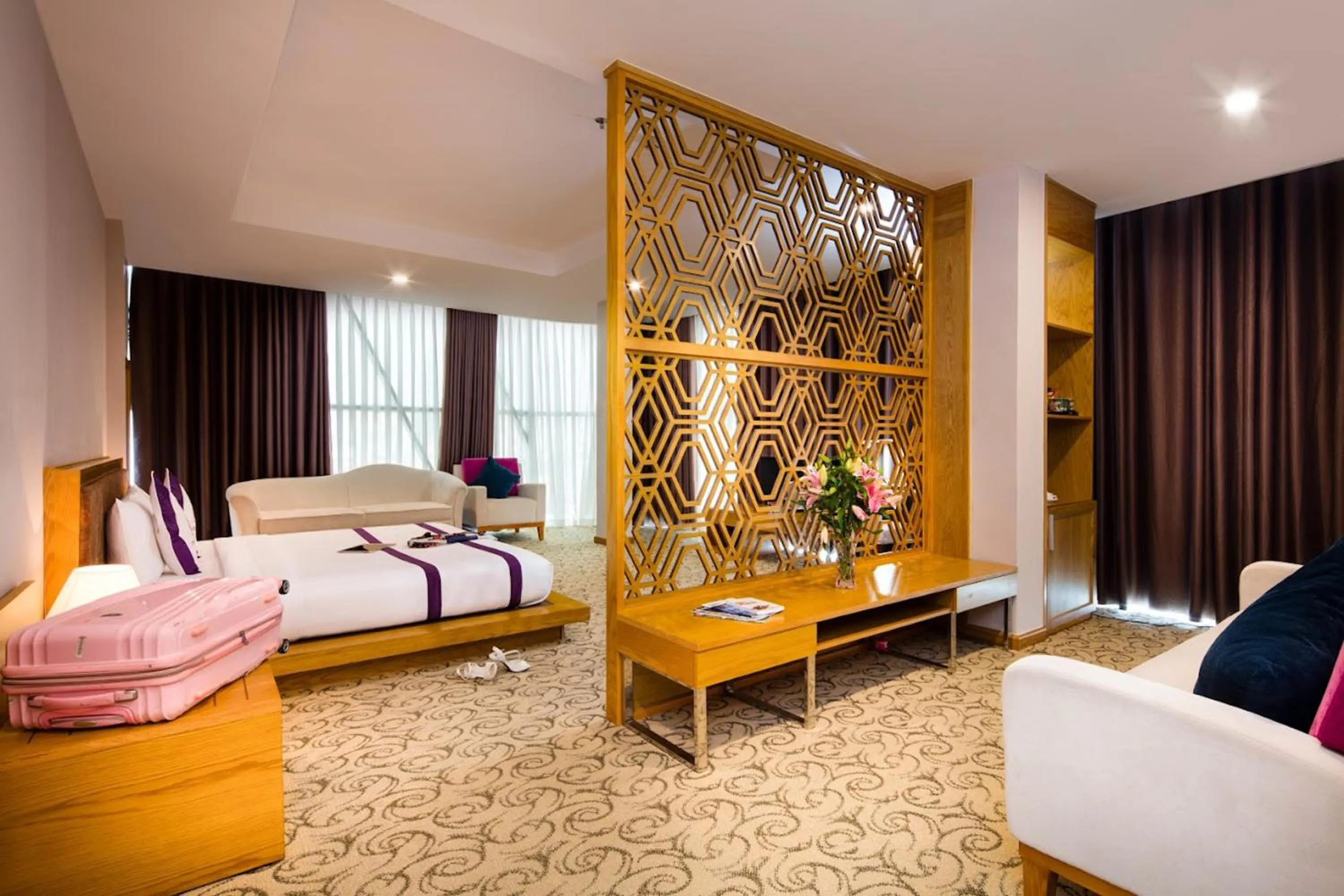 View (from property/room), Bed in TTC Hotel Deluxe Airport