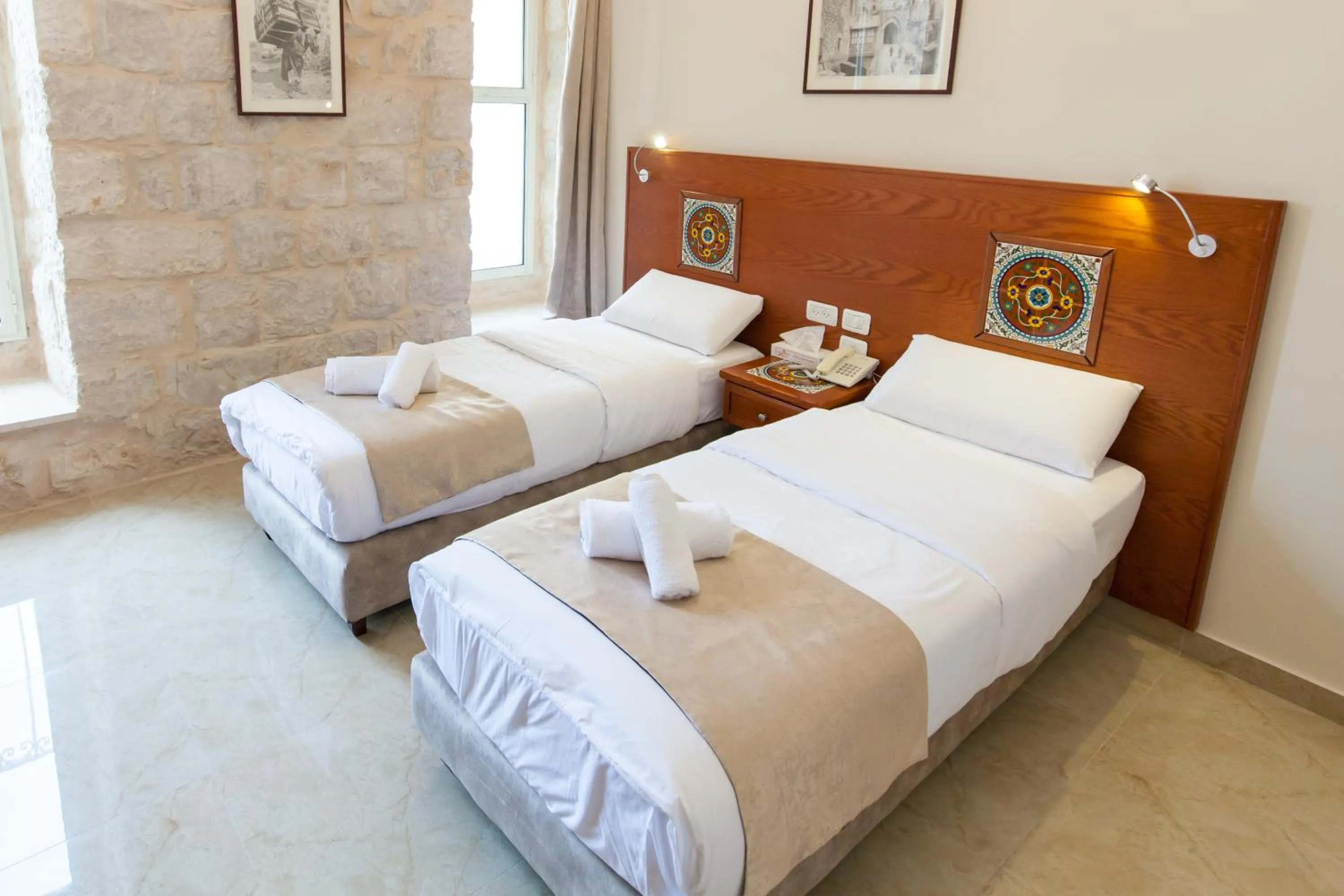 Photo of the whole room, Bed in Azzahra Boutique Hotel & Restaurant - Jerusalem
