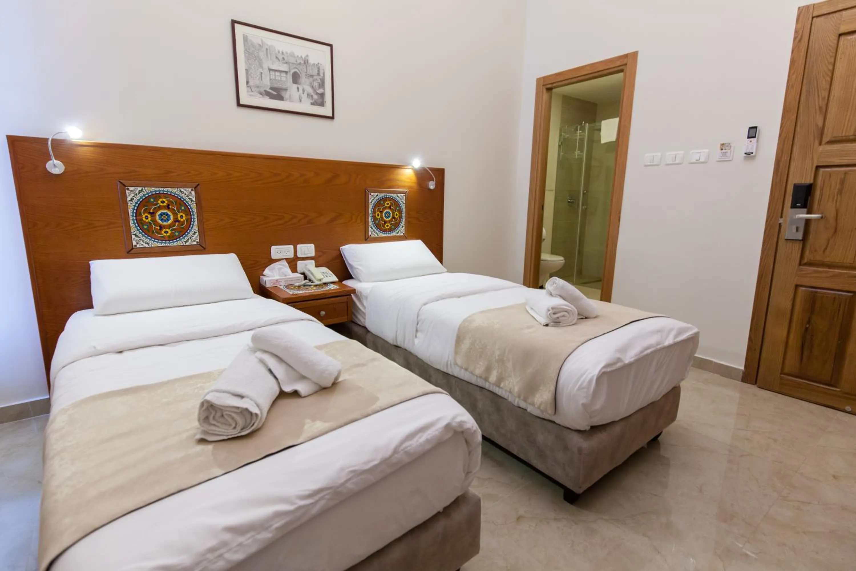 Photo of the whole room, Bed in Azzahra Boutique Hotel & Restaurant - Jerusalem