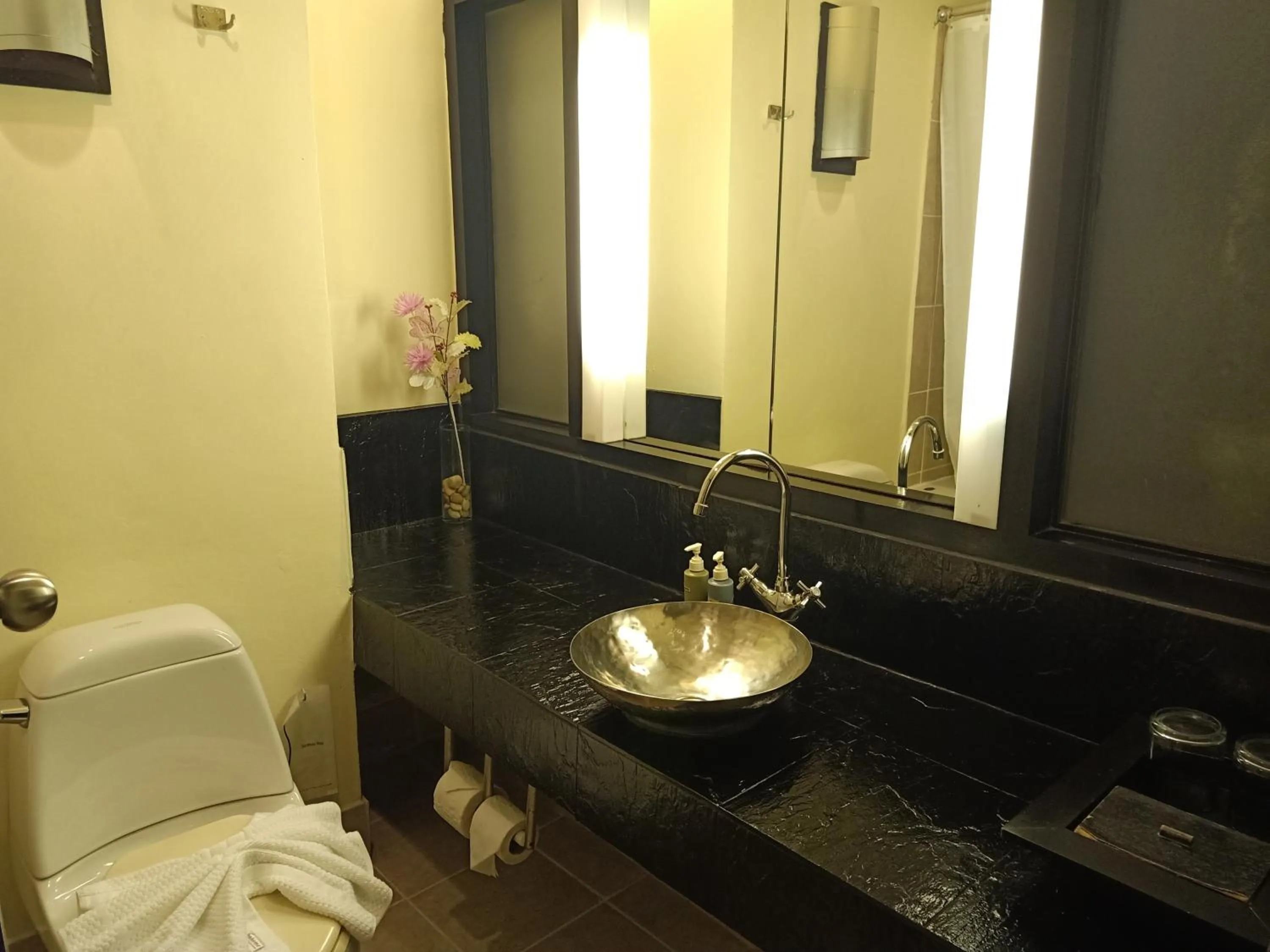 Bathroom in Amarin Samui Hotel - SHA Plus Certified