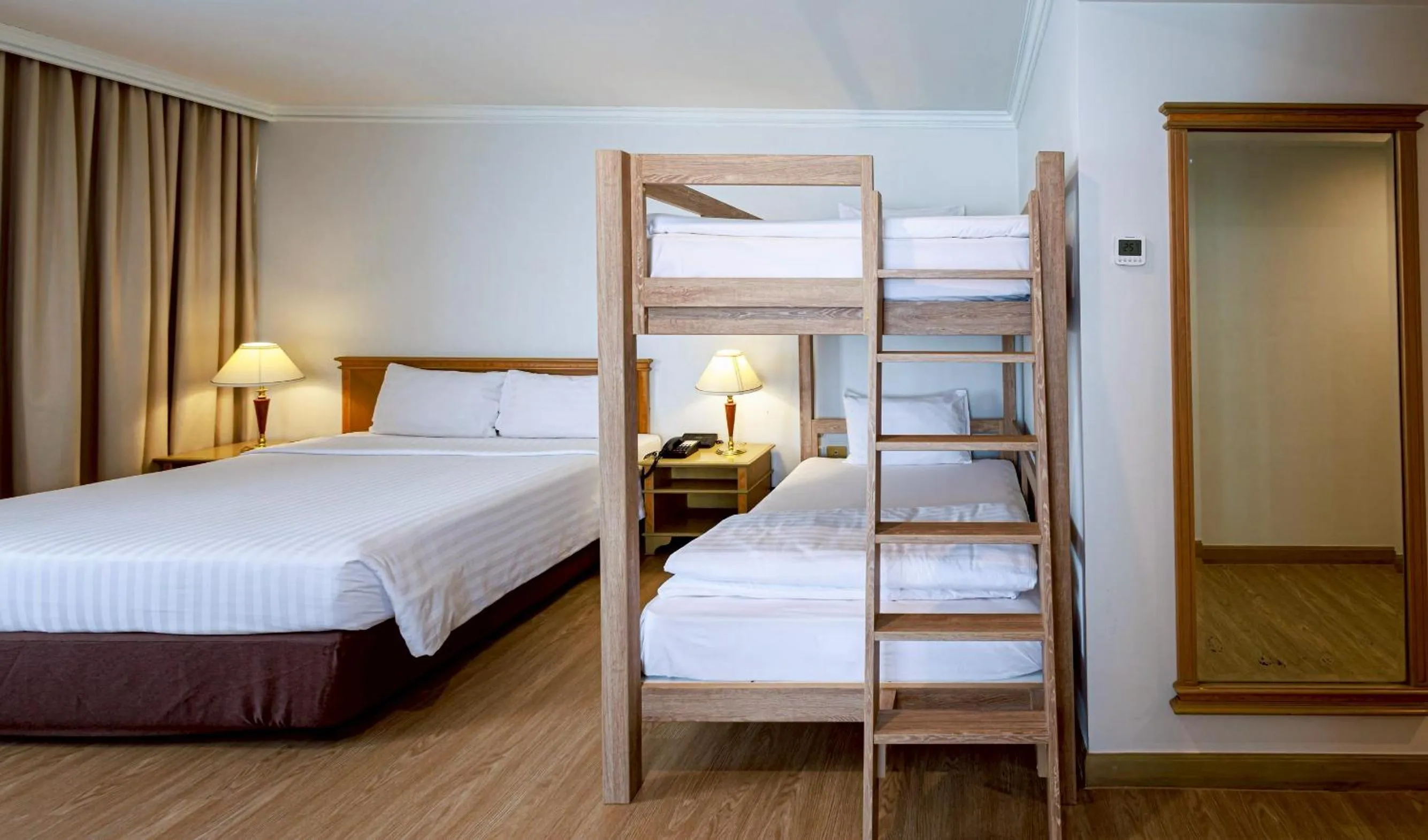 Bed in Prince Palace Hotel Bangkok