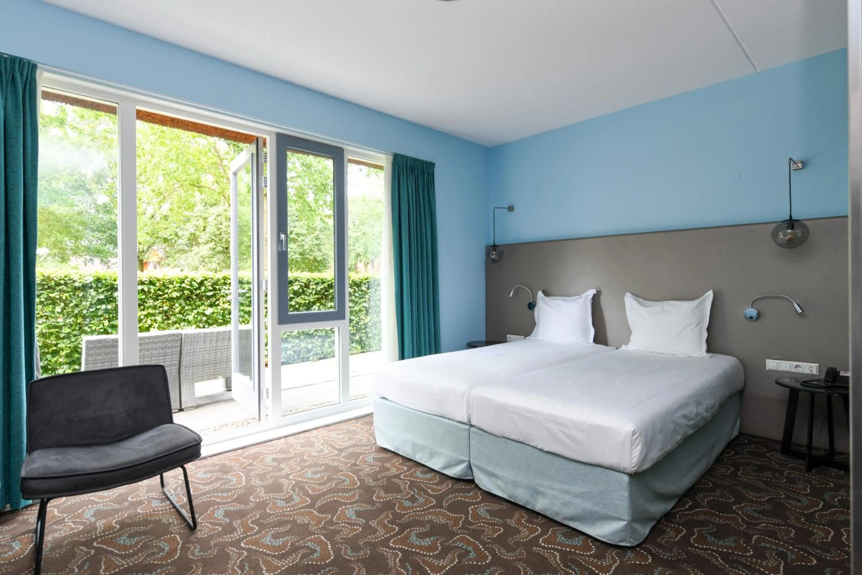 Bed in Hotel De Roode Schuur