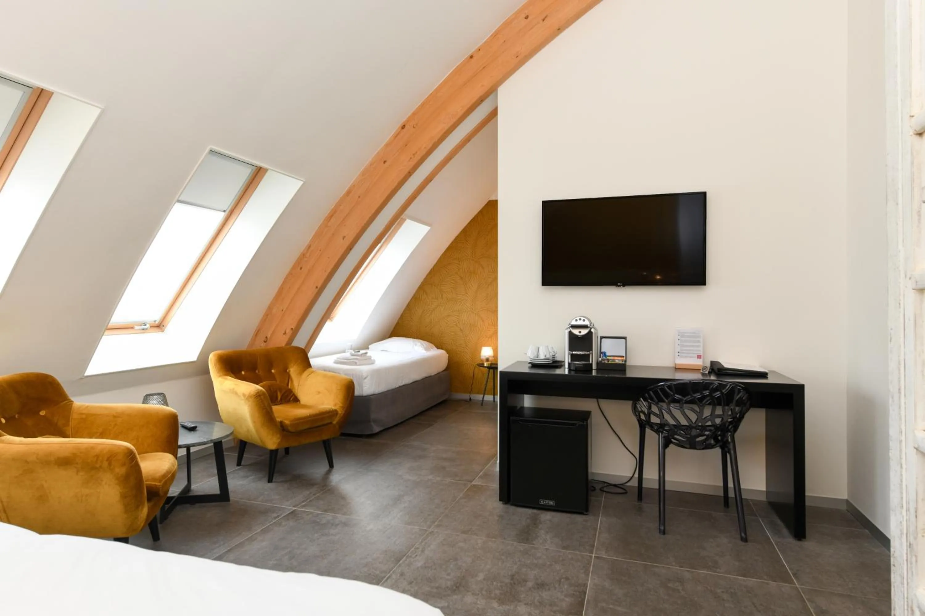 Bed in Hotel De Roode Schuur