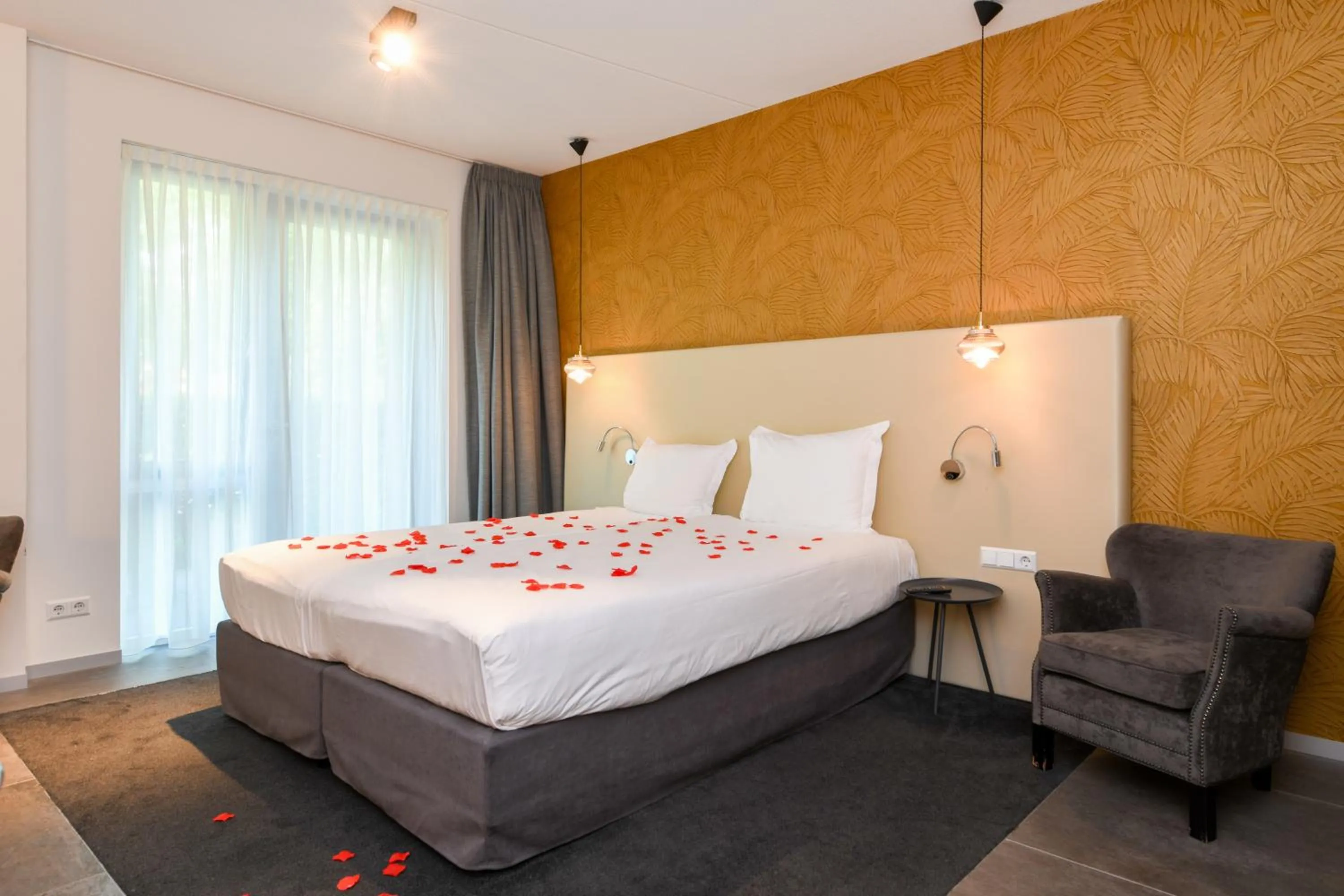 Bed in Hotel De Roode Schuur