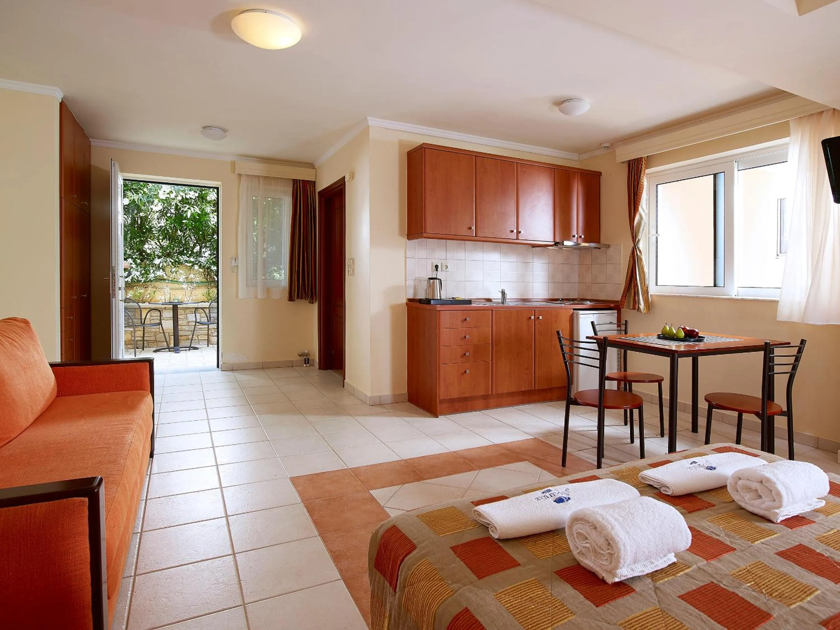 Bed in Avantis Suites Hotel